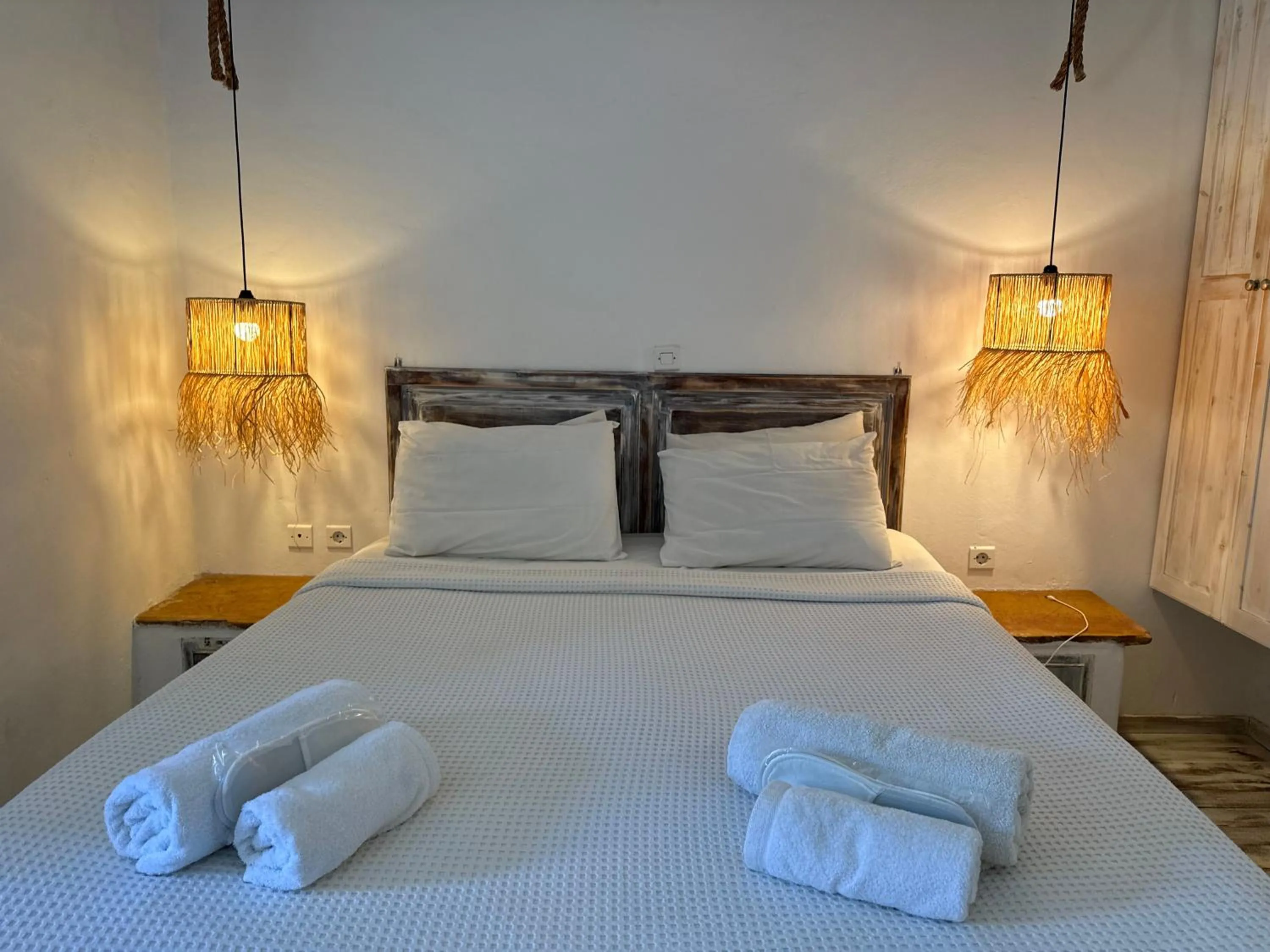 Bed in Atlazia Suites