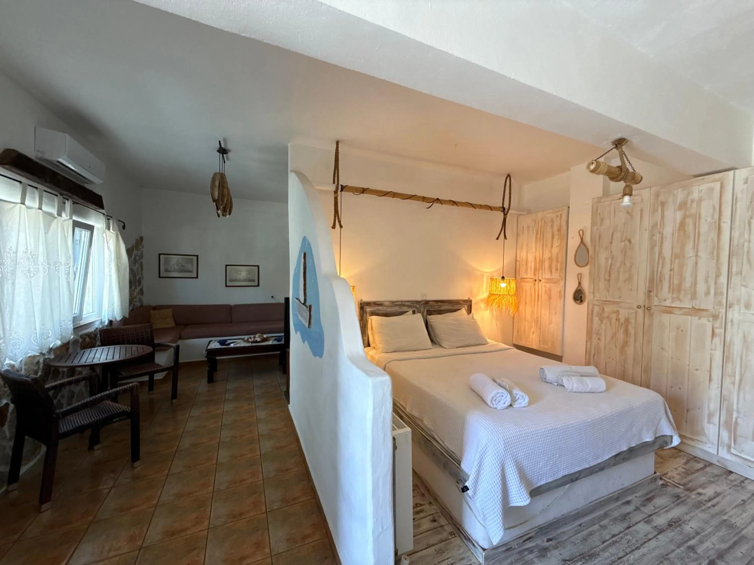 Bed in Atlazia Suites