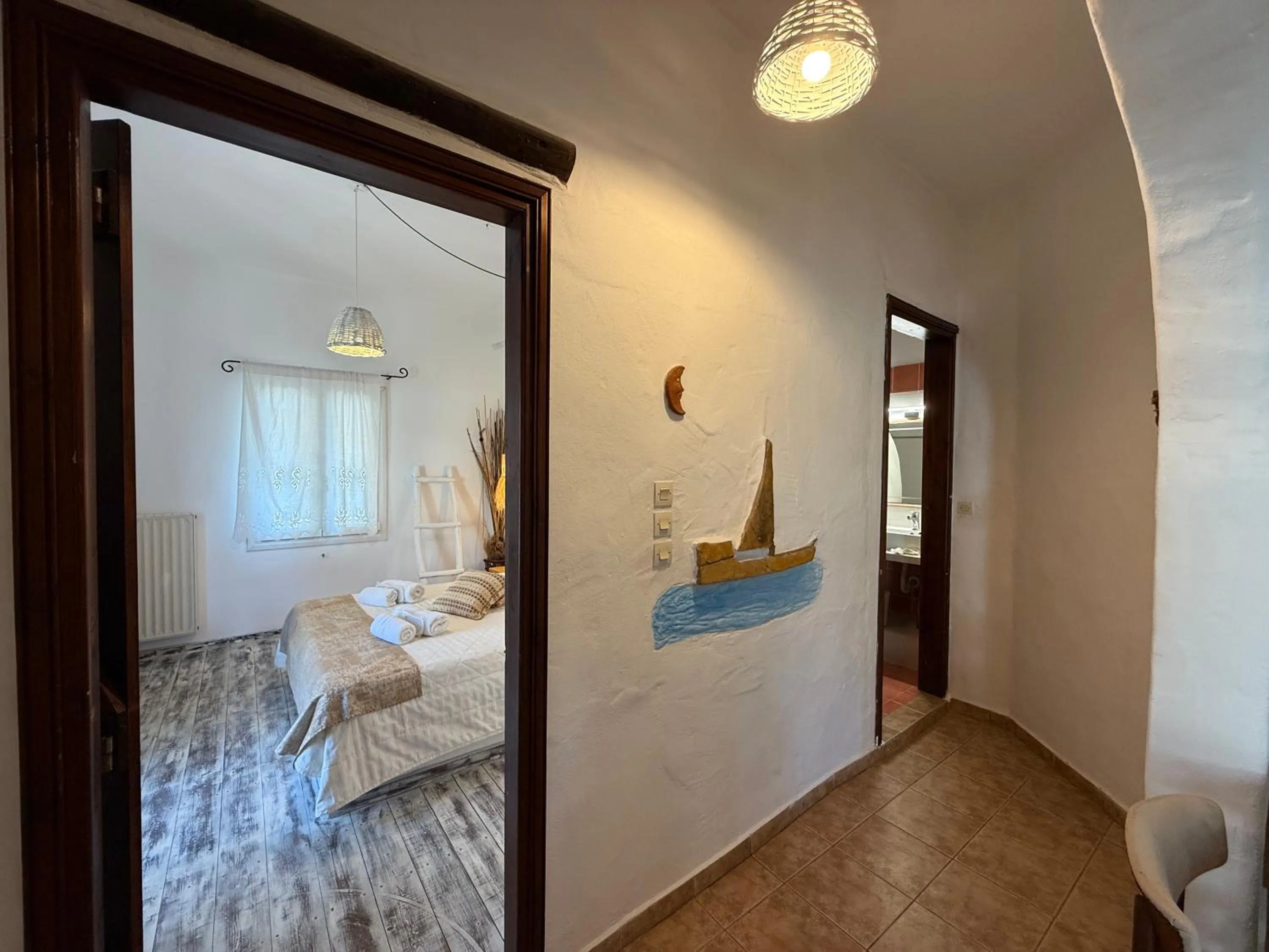 Seating area, Bed in Atlazia Suites