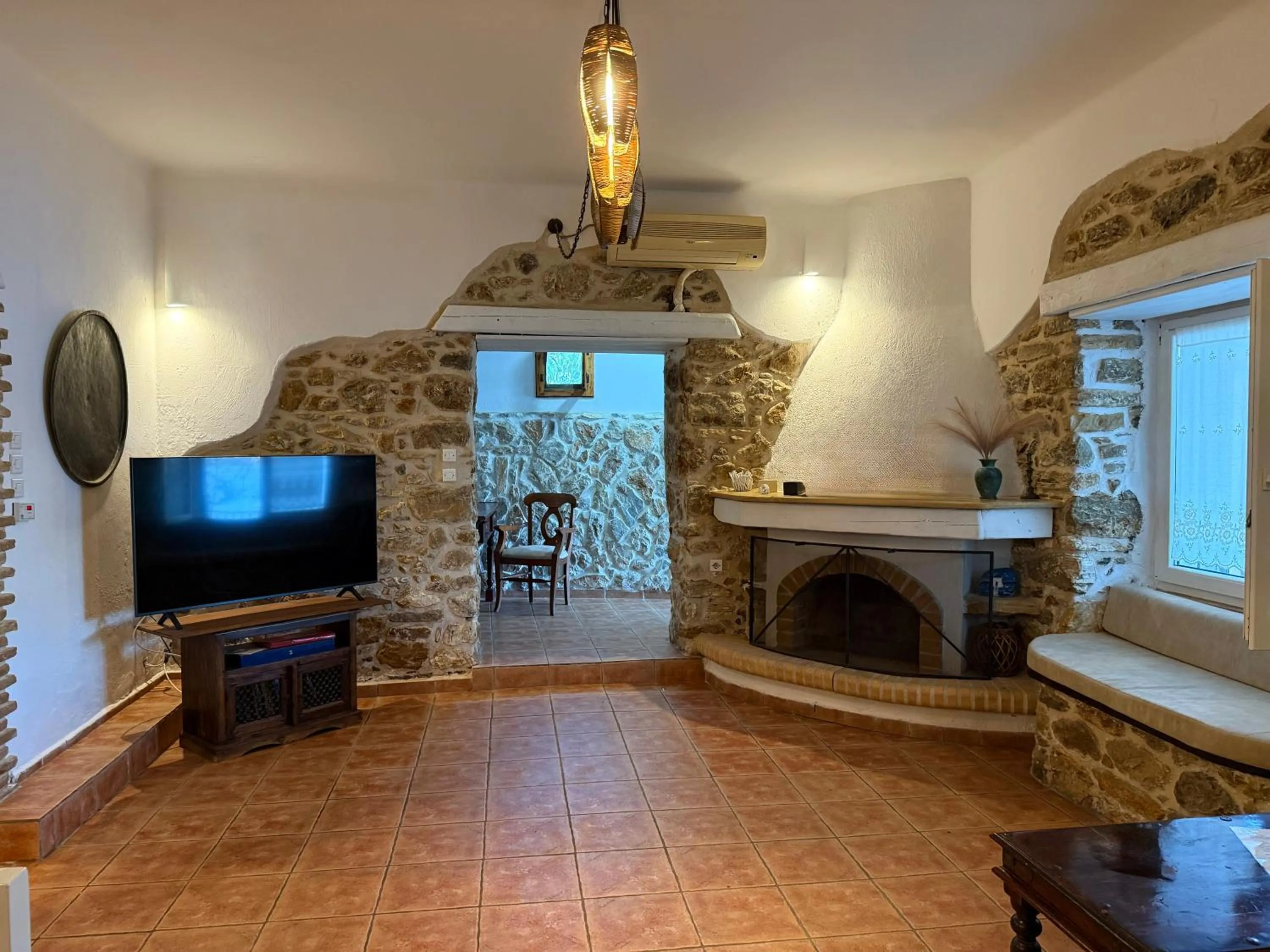 Communal lounge/ TV room in Atlazia Suites