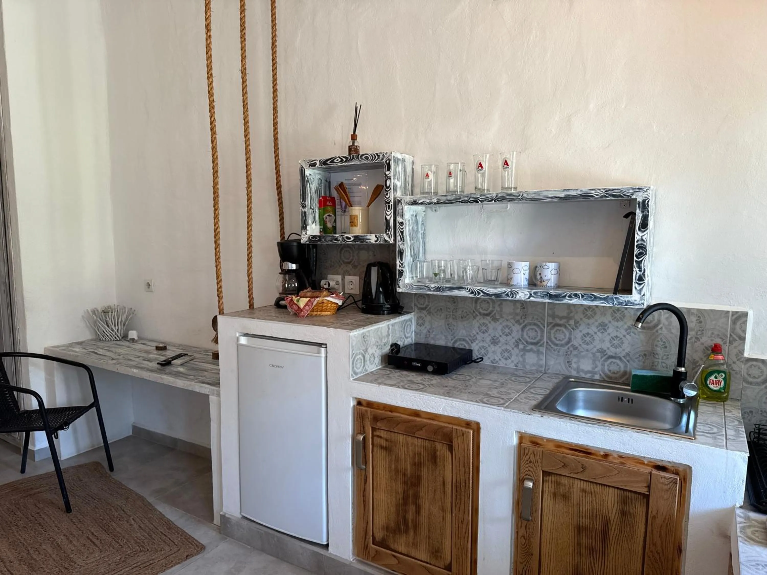 Kitchen or kitchenette in Atlazia Suites