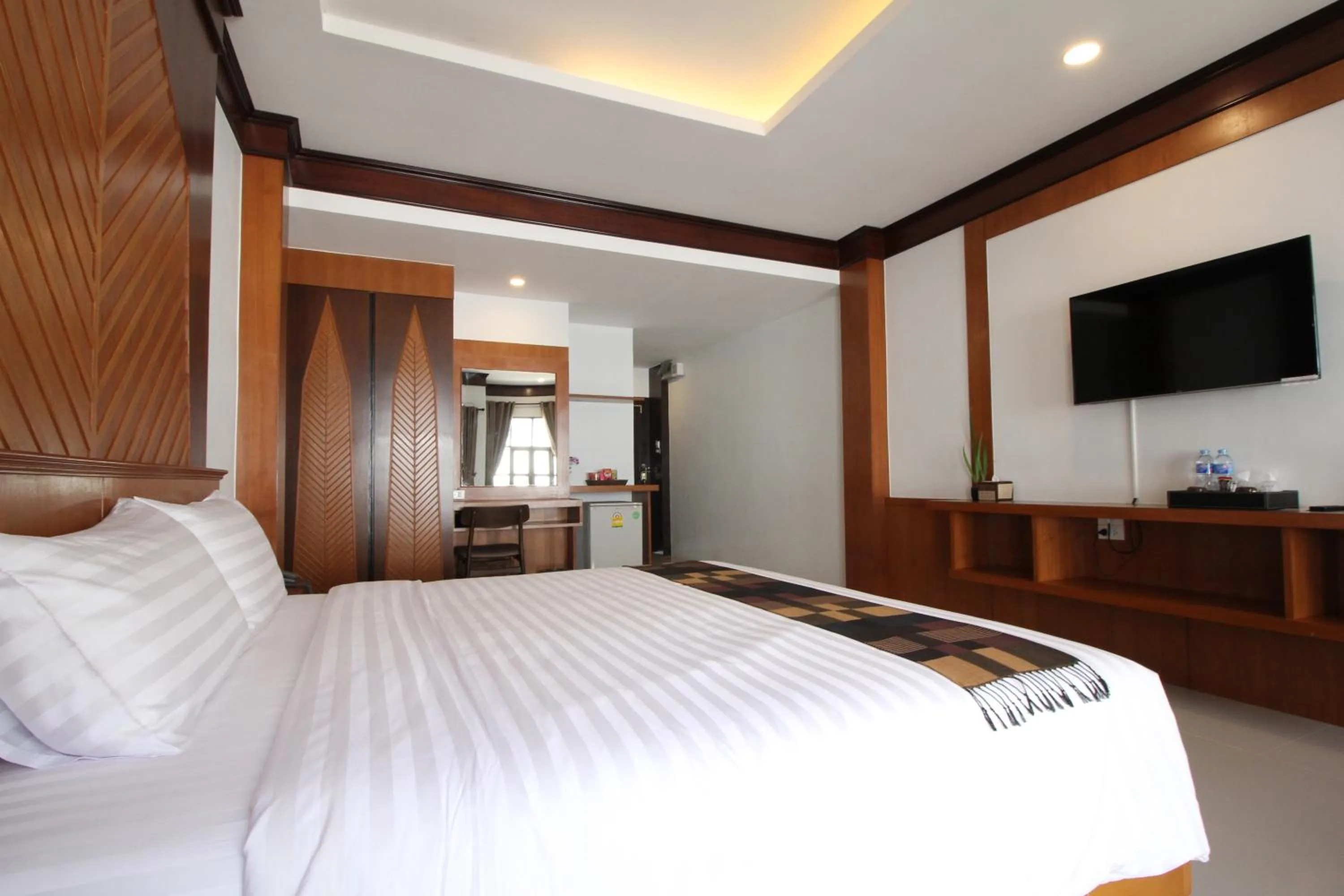 Bed in Nonghan Grand Hotel and Resort