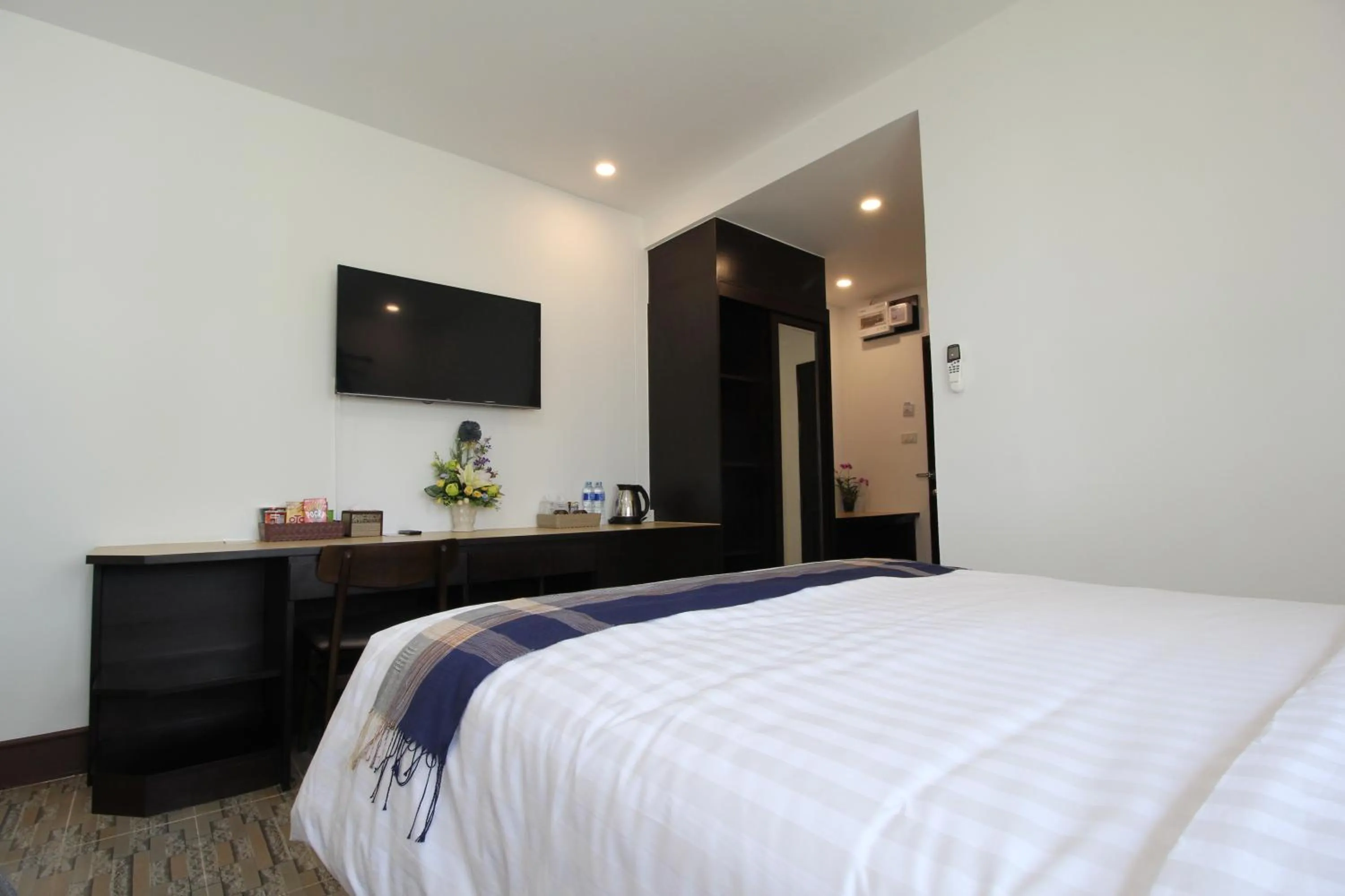 Bed in Nonghan Grand Hotel and Resort