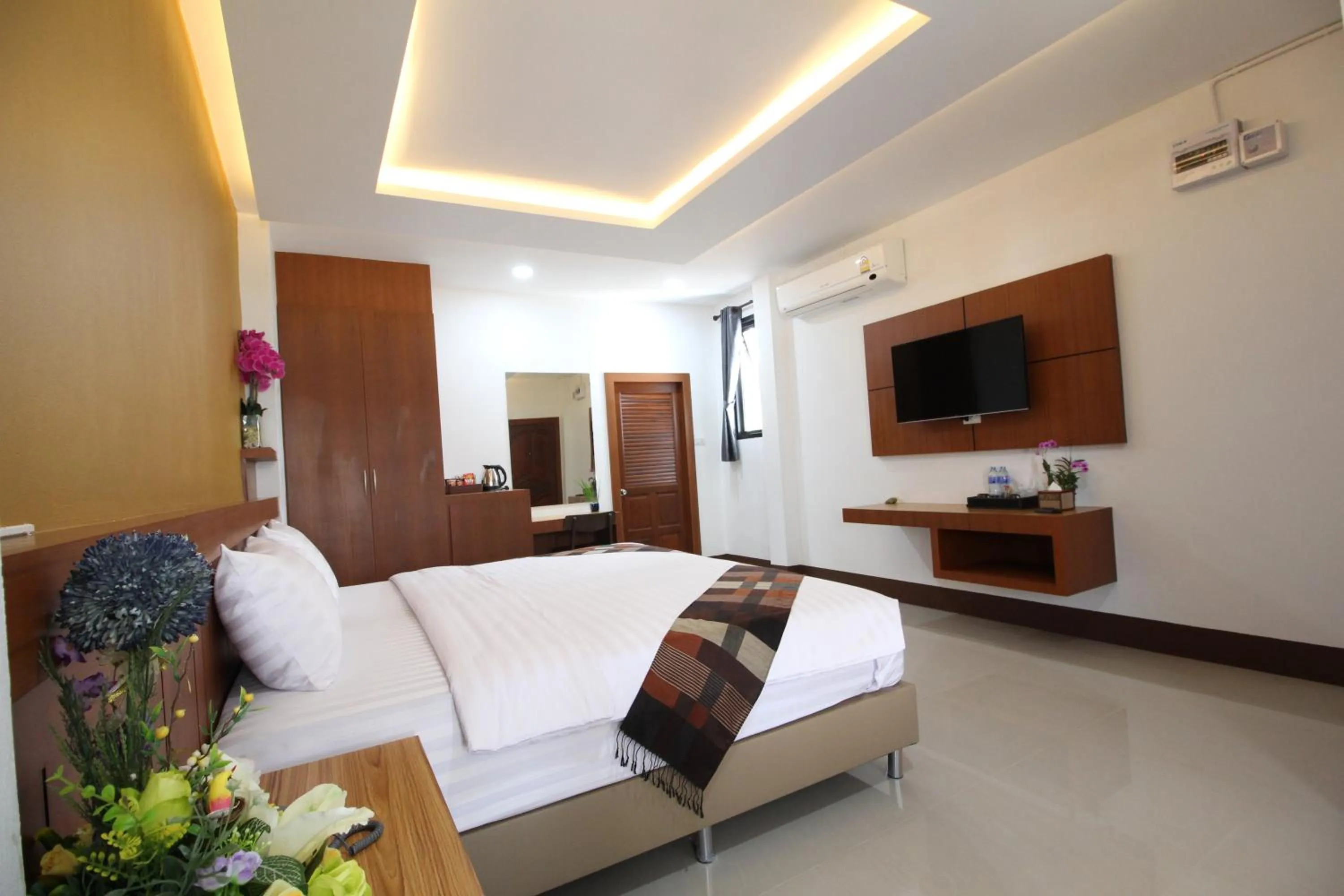 Bed in Nonghan Grand Hotel and Resort