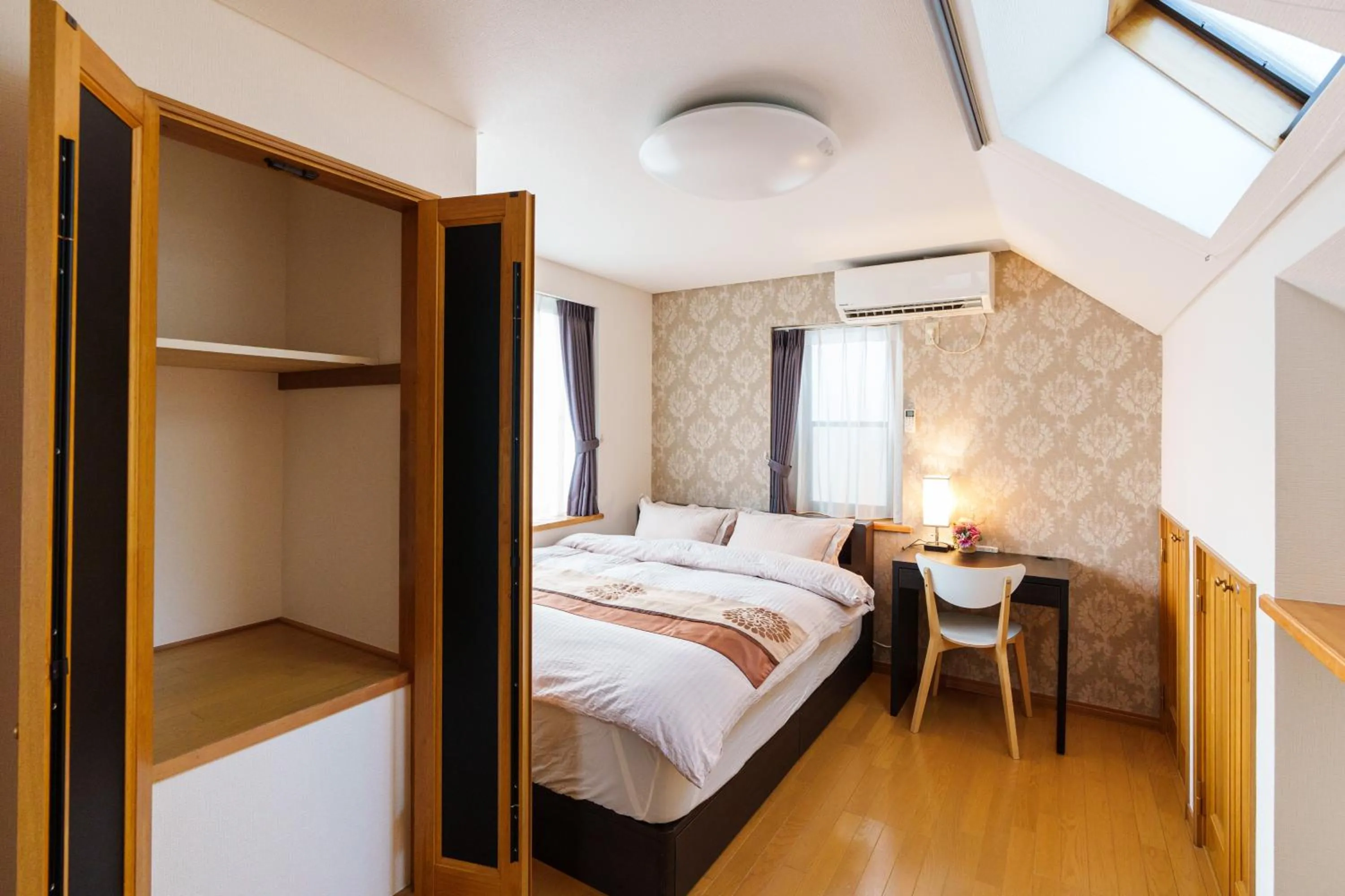 Bedroom, Bed in Luxury Guest House in Tokyo Shinjuku