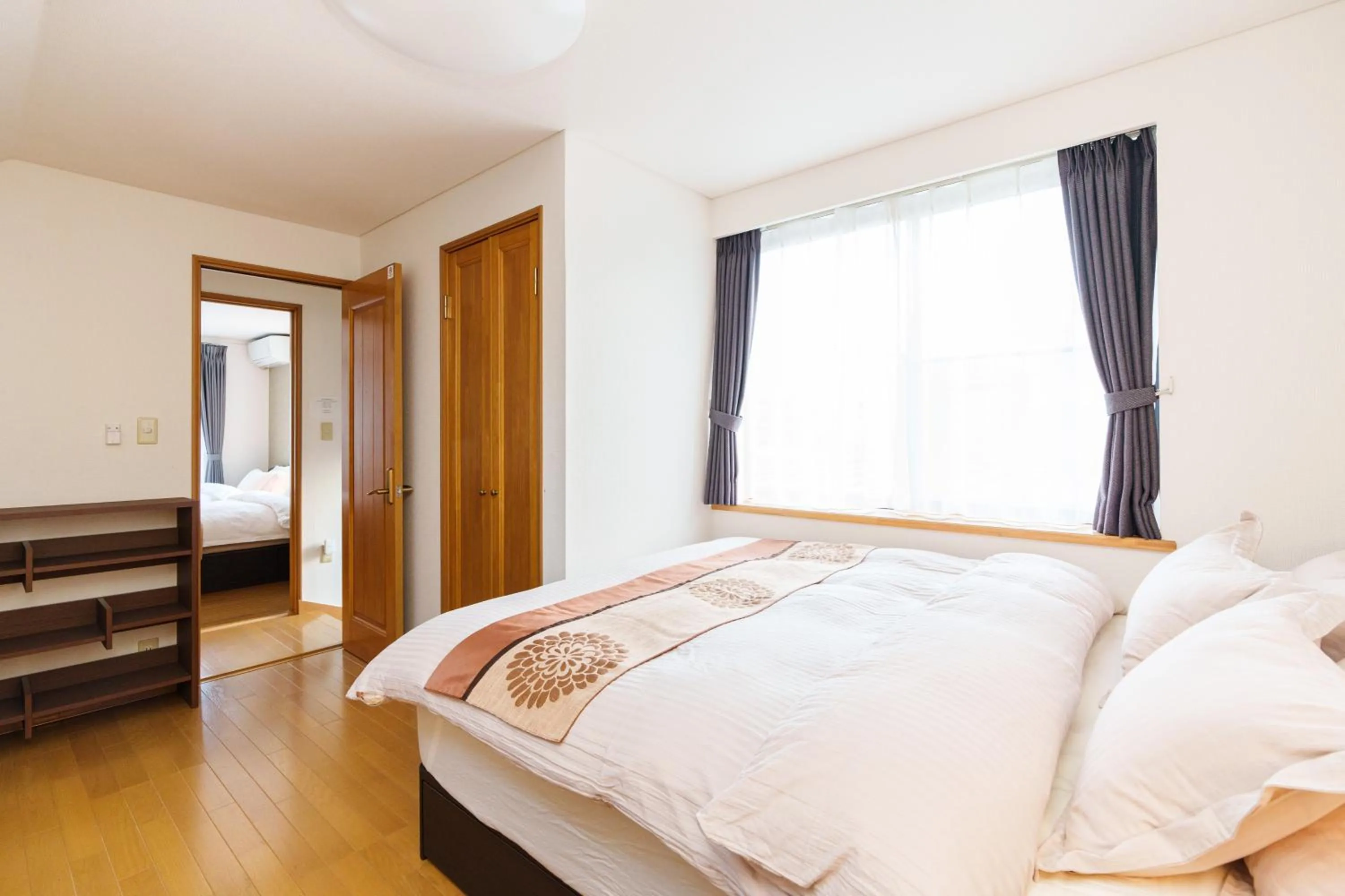 Photo of the whole room, Bed in Luxury Guest House in Tokyo Shinjuku