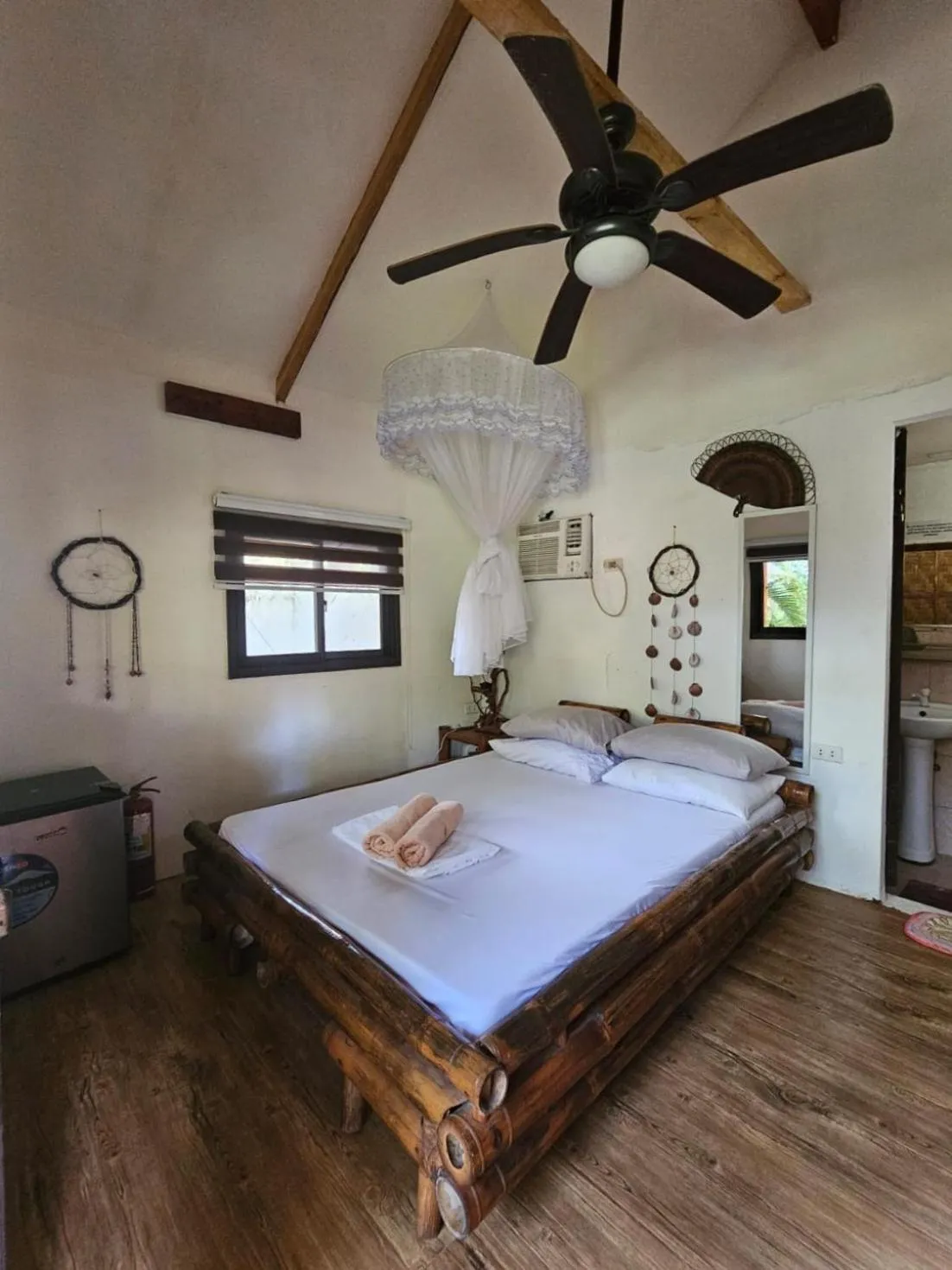 Bed in Big BamBoo Beach Resort Sipalay