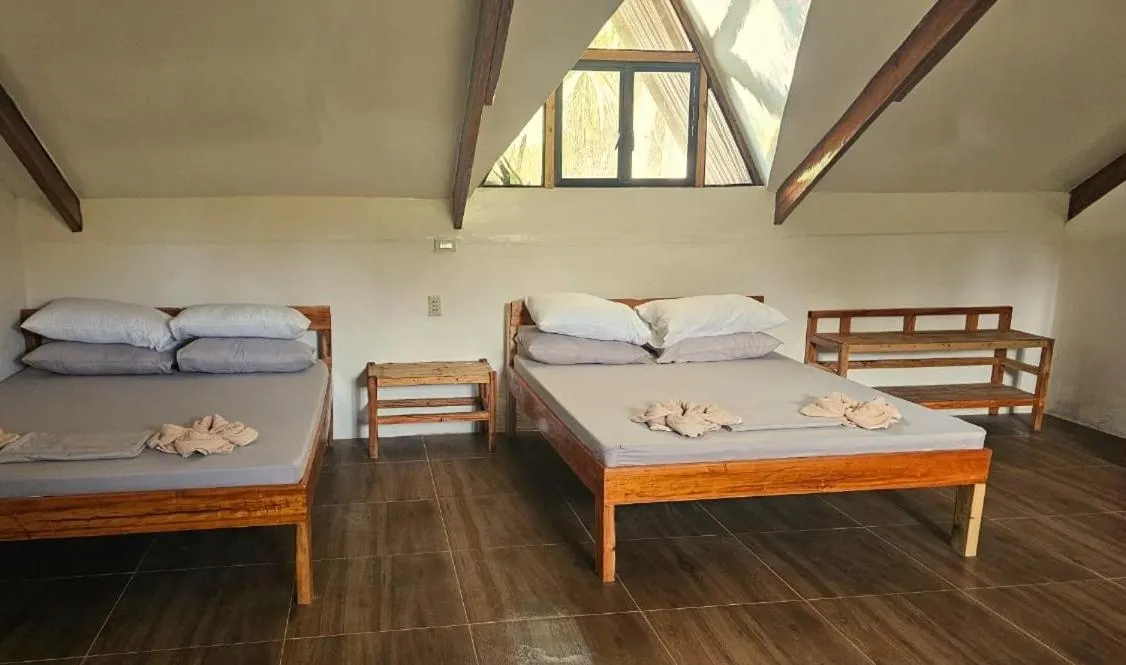 Bed in Big BamBoo Beach Resort Sipalay