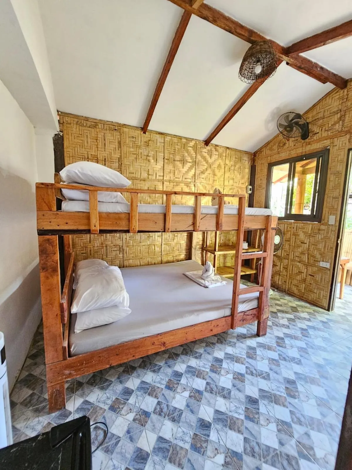Bed in Big BamBoo Beach Resort Sipalay