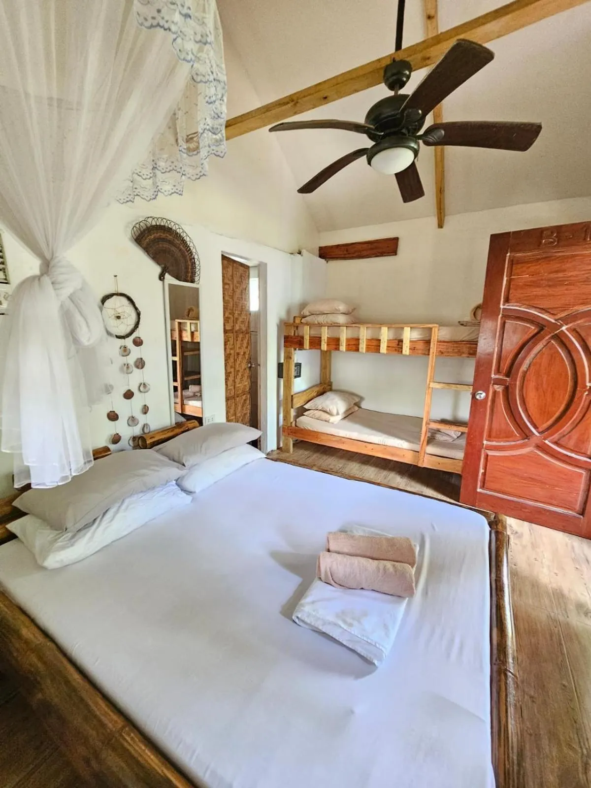 Bed in Big BamBoo Beach Resort Sipalay
