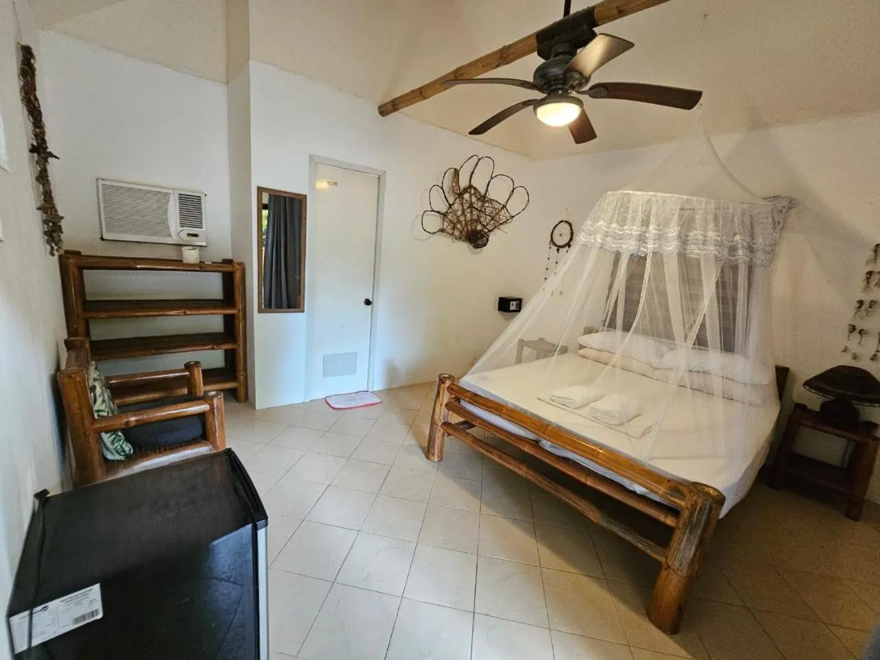 Bed in Big BamBoo Beach Resort Sipalay