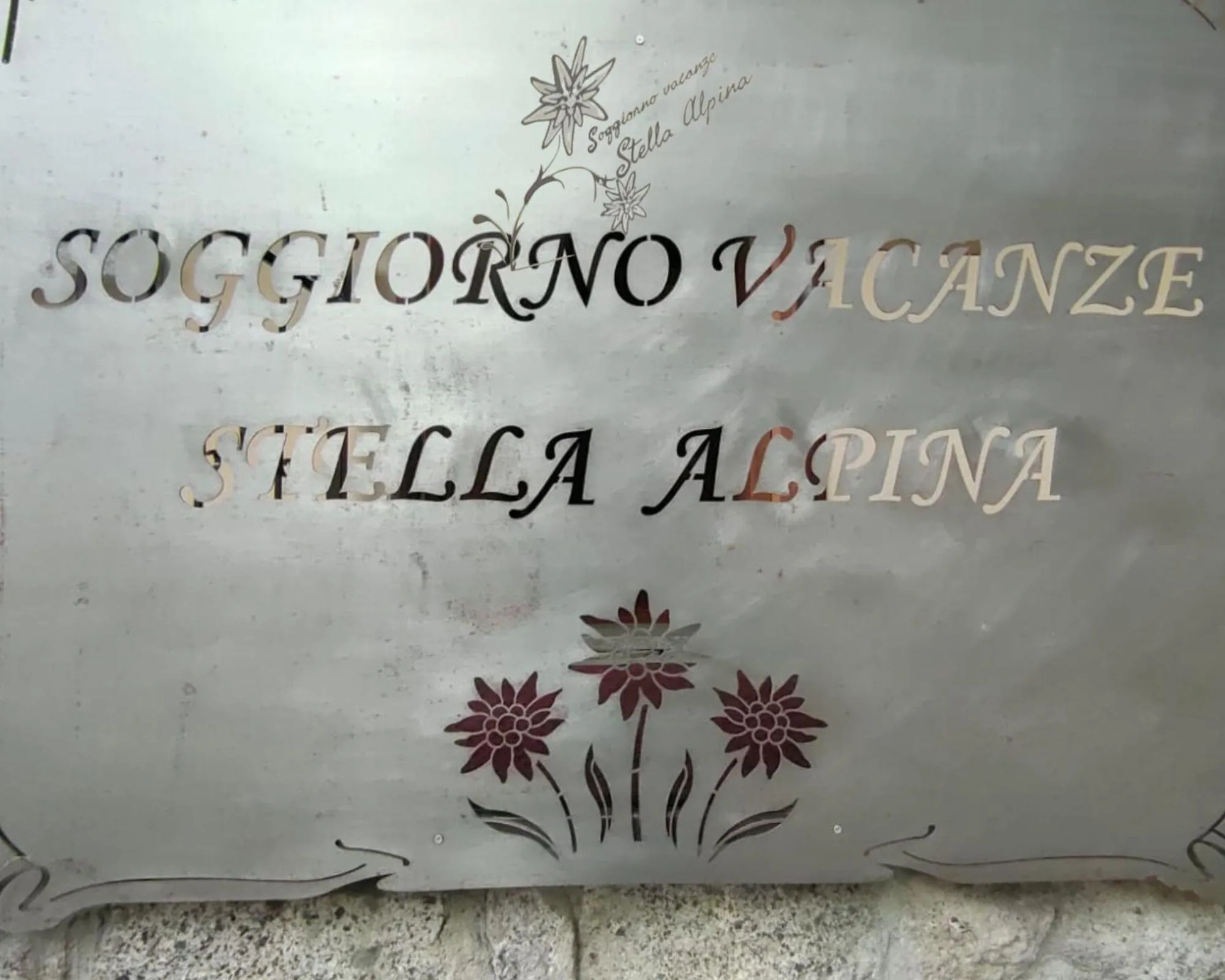 Property logo or sign in Soggiorno Vacanze Stella Alpina