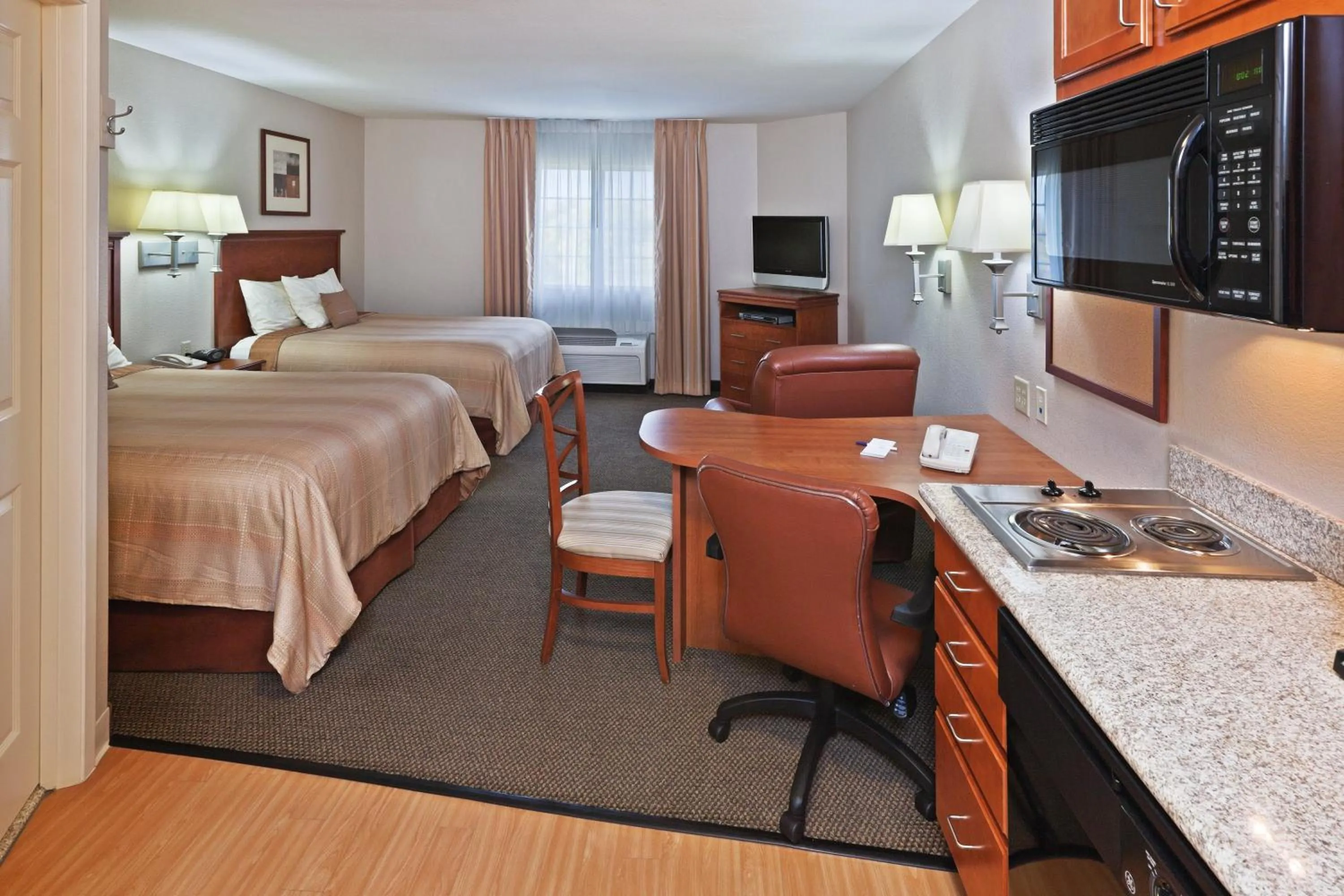 Photo of the whole room, Bed in Candlewood Suites Wichita Falls at Maurine Street by IHG