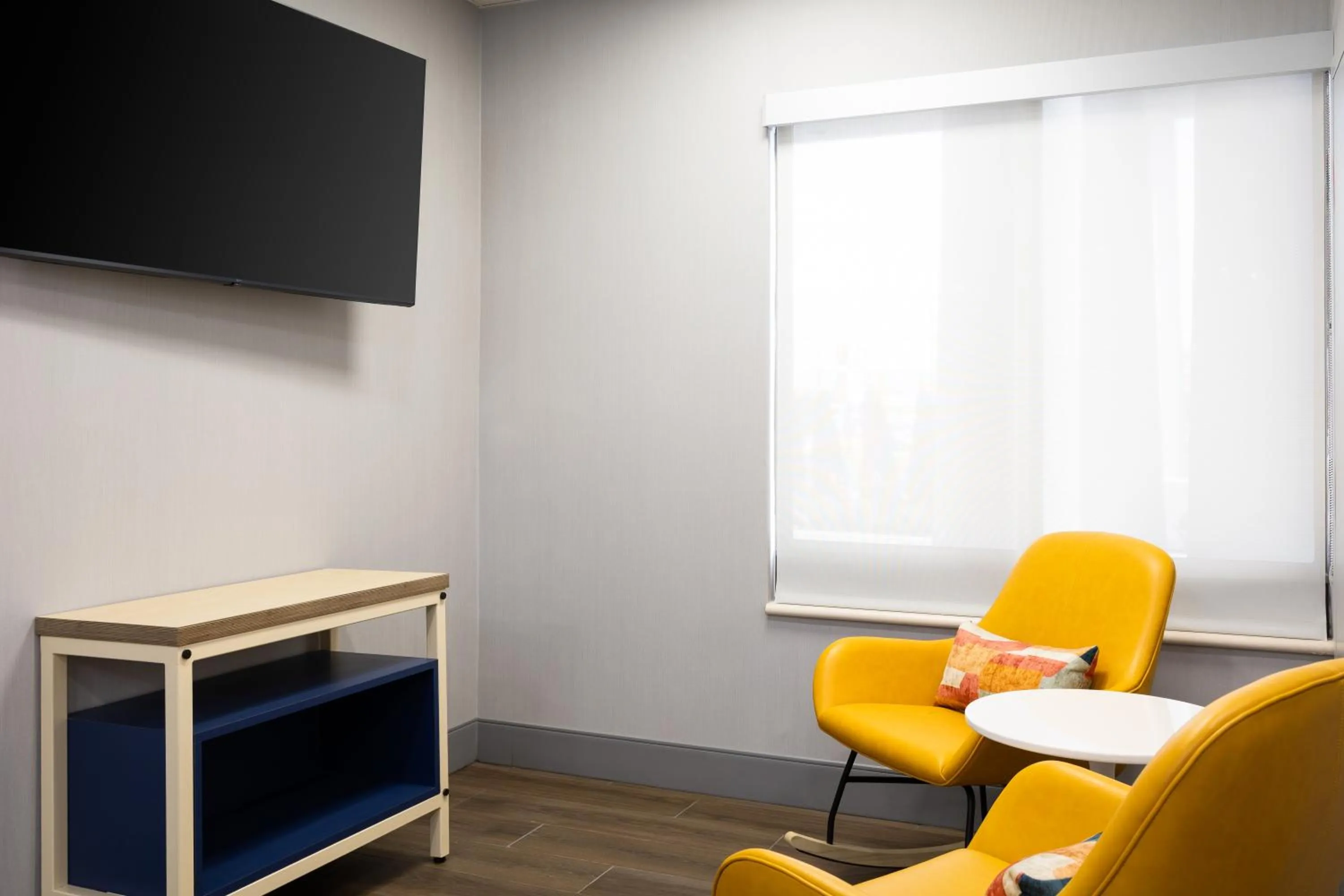 Seating area in Spark By Hilton Guelph