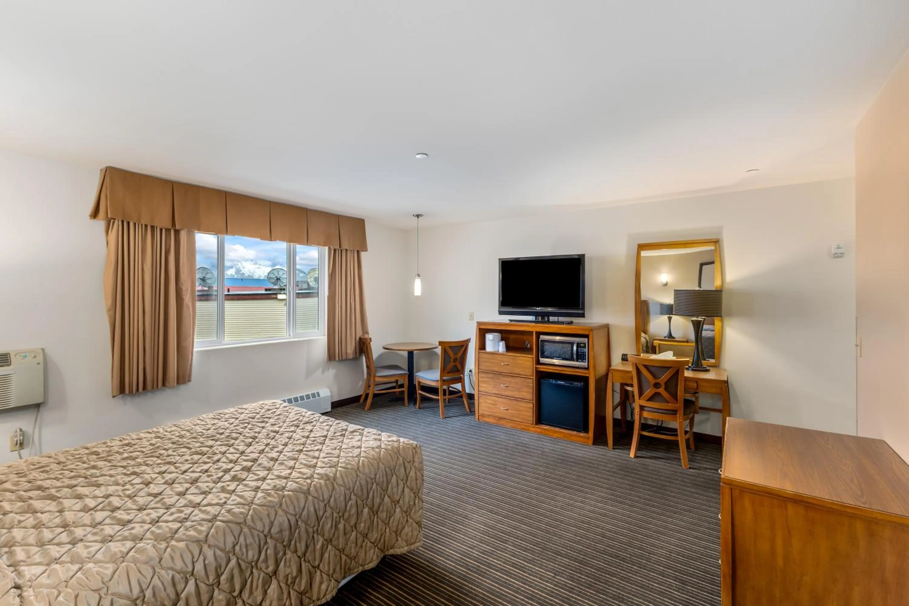 Bed in Breeze Inn Hotel & Motel