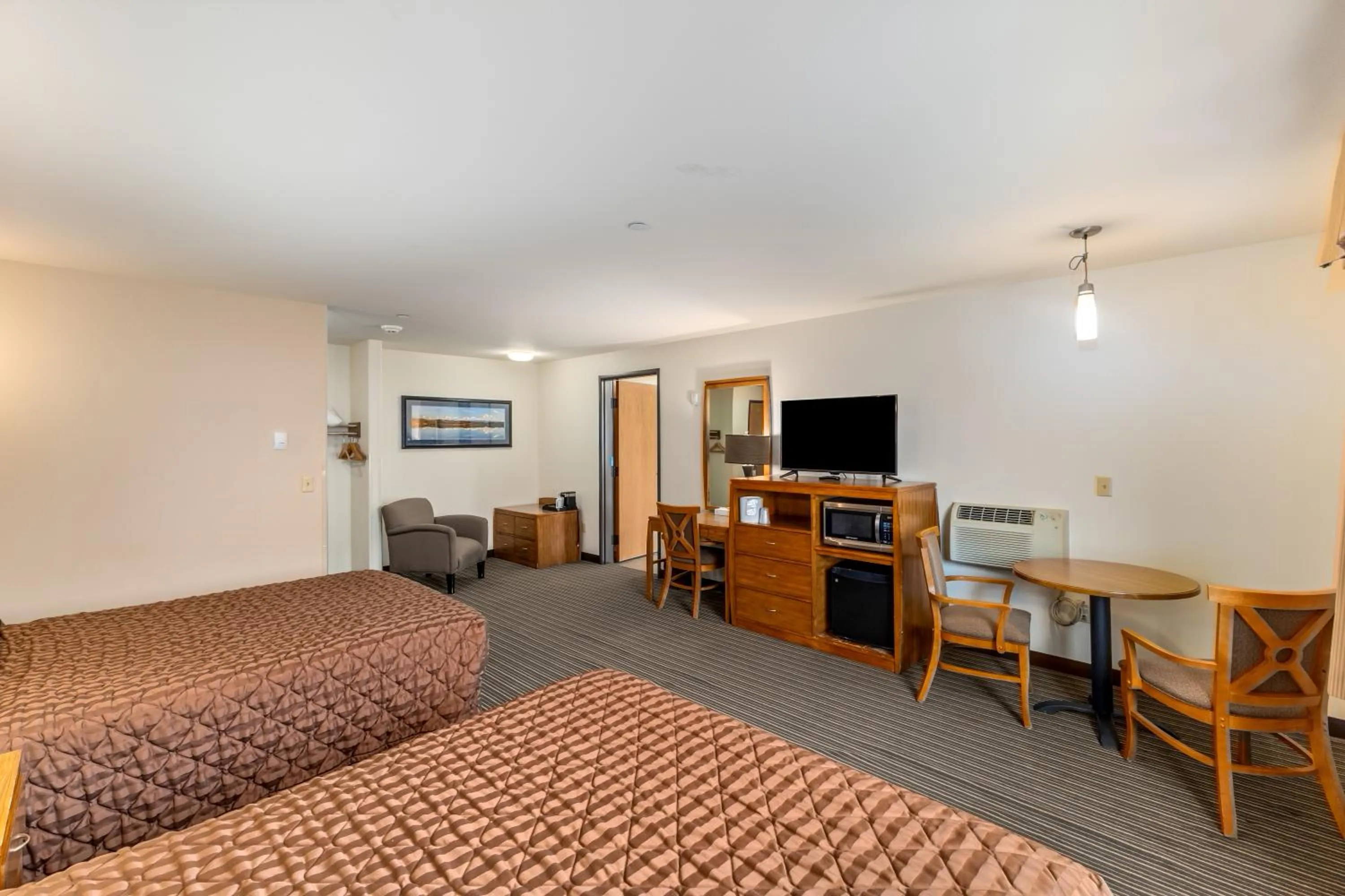 Bed in Breeze Inn Hotel & Motel