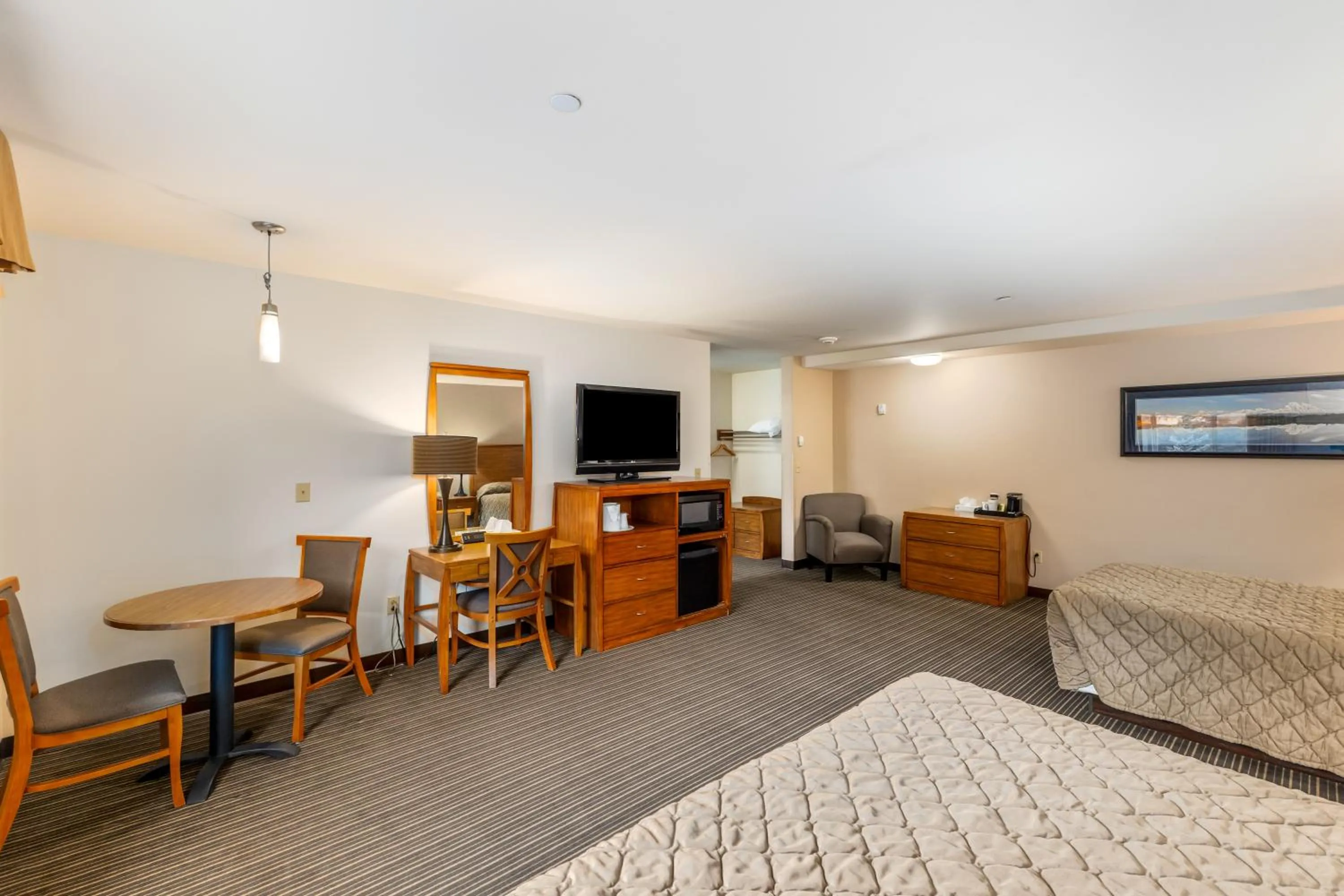 Bed in Breeze Inn Hotel & Motel