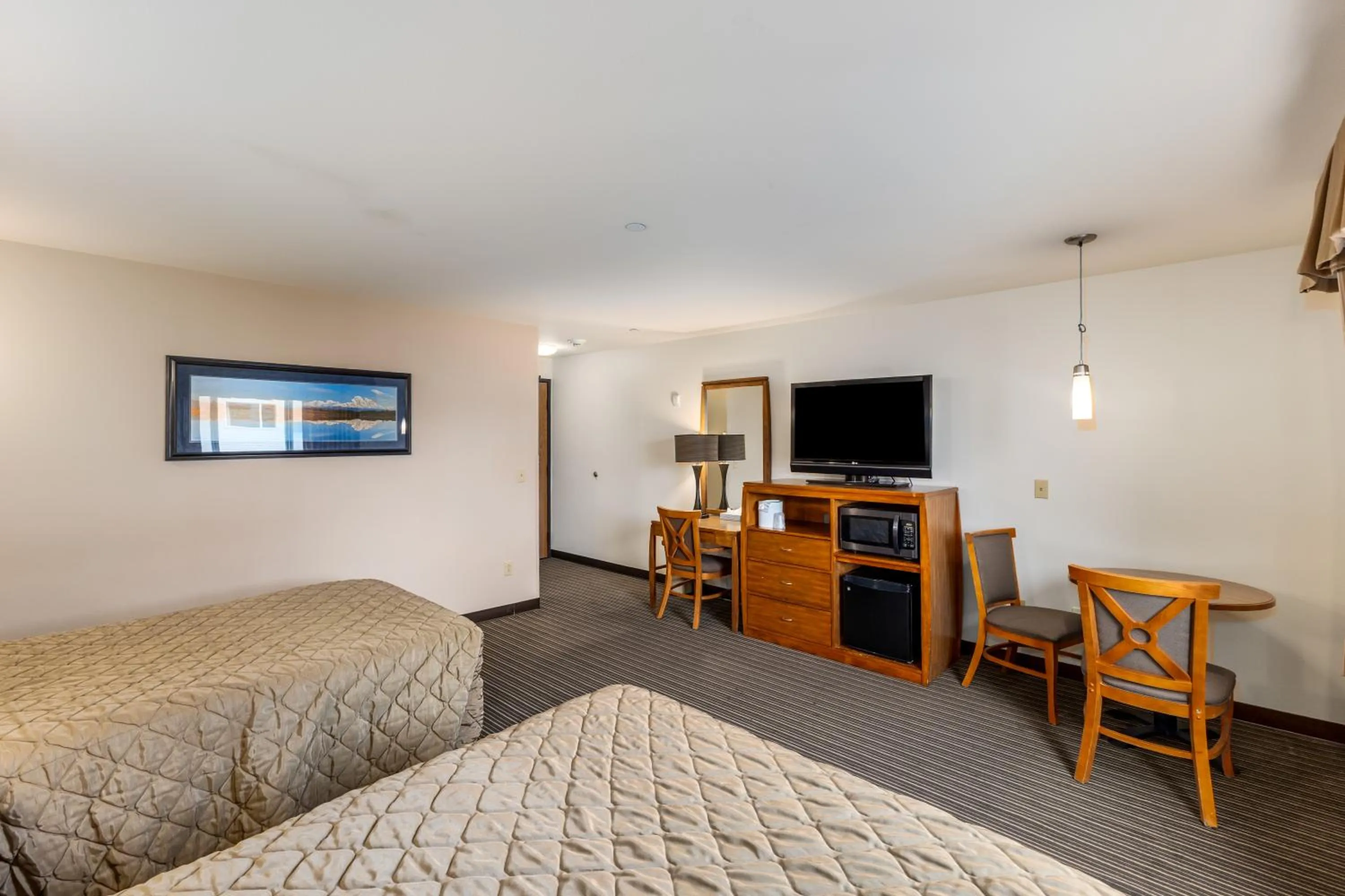 Bed in Breeze Inn Hotel & Motel