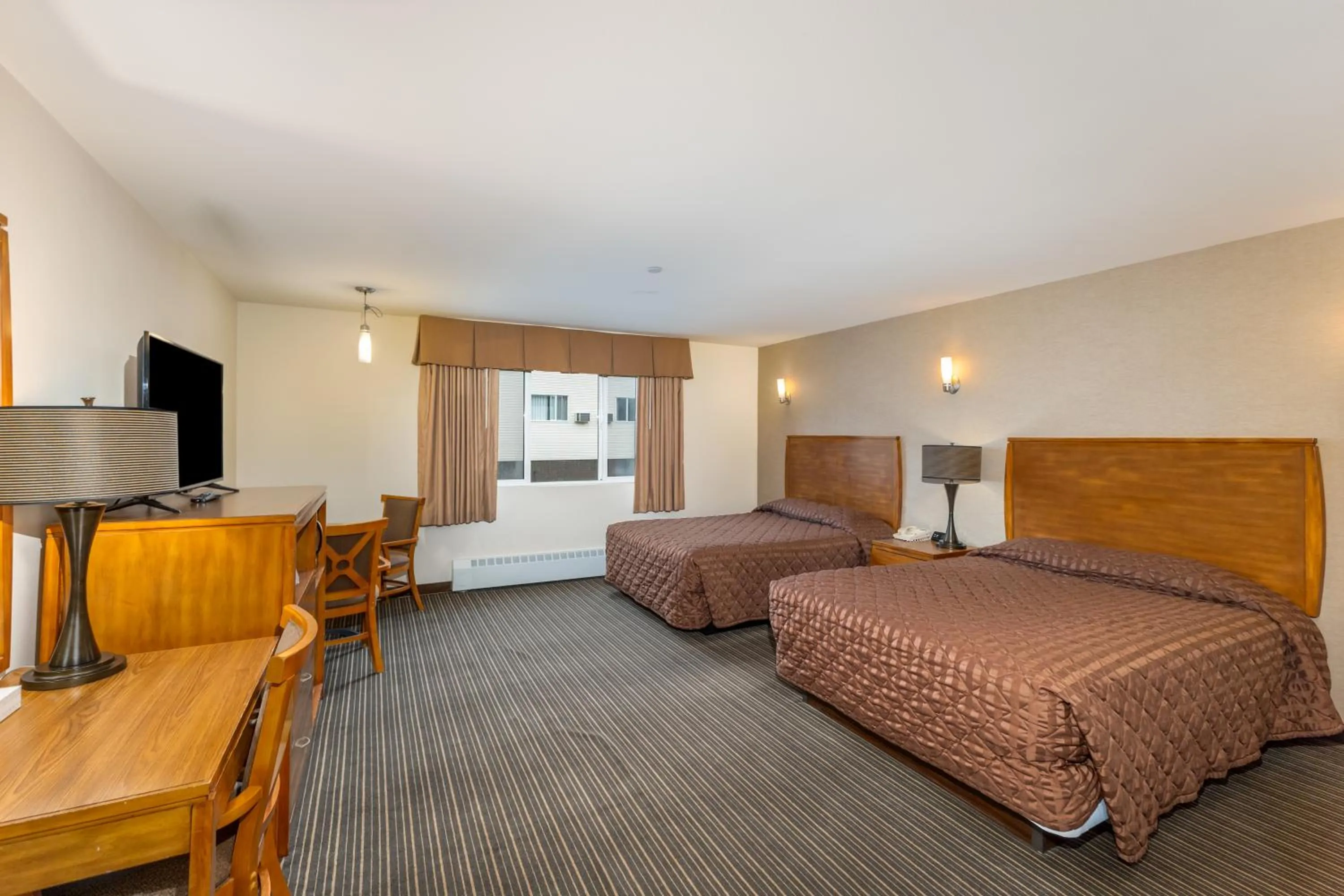 Bedroom, Bed in Breeze Inn Hotel & Motel