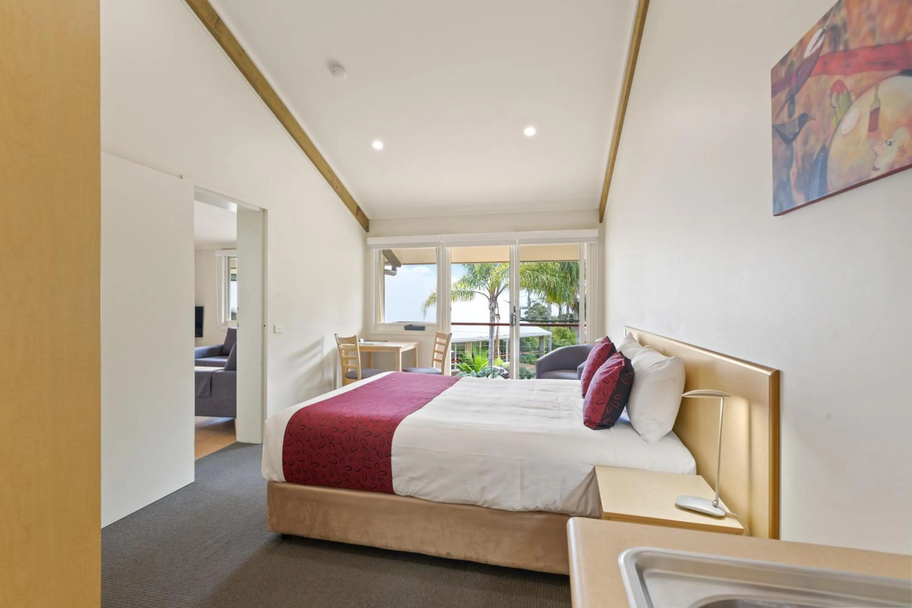 Bed in Tathra Beach House Holiday Apartments
