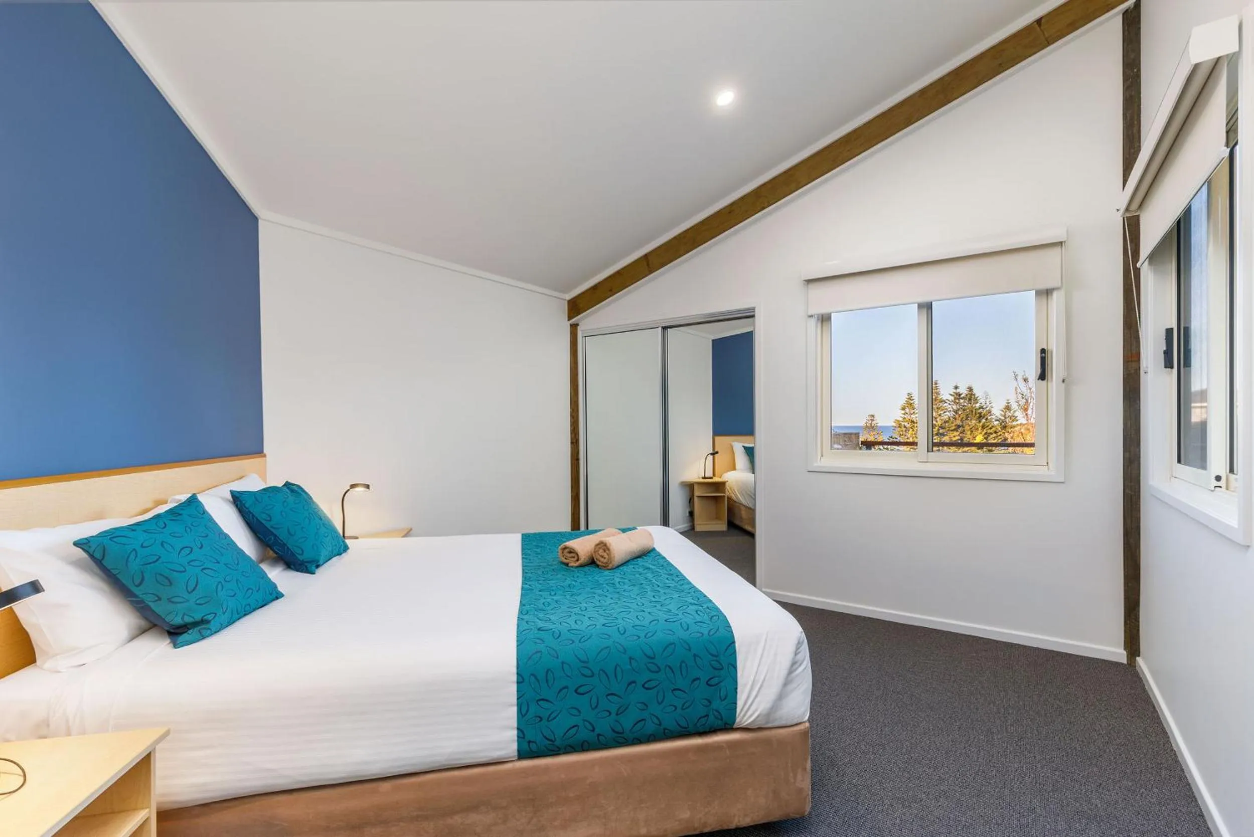 Bed in Tathra Beach House Holiday Apartments