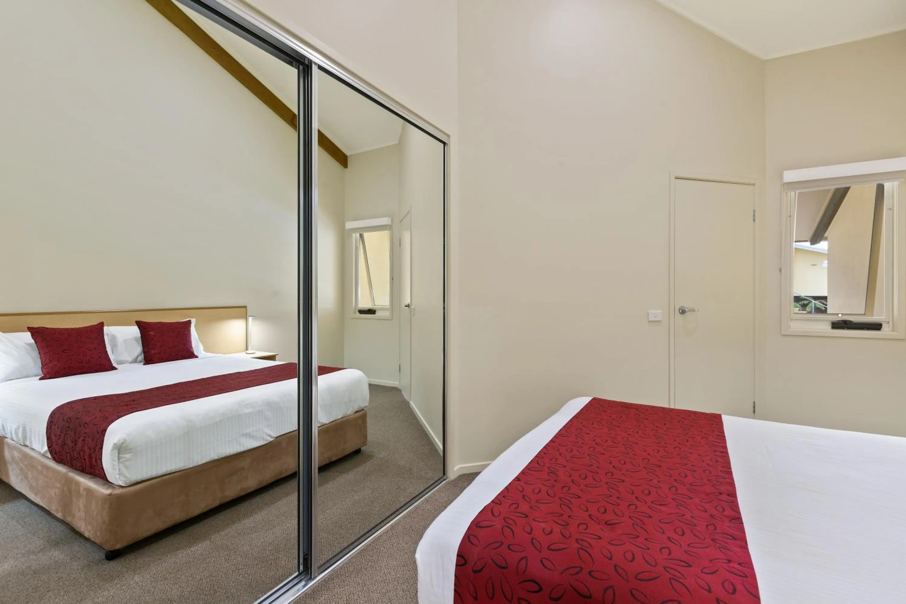 Bed in Tathra Beach House Holiday Apartments