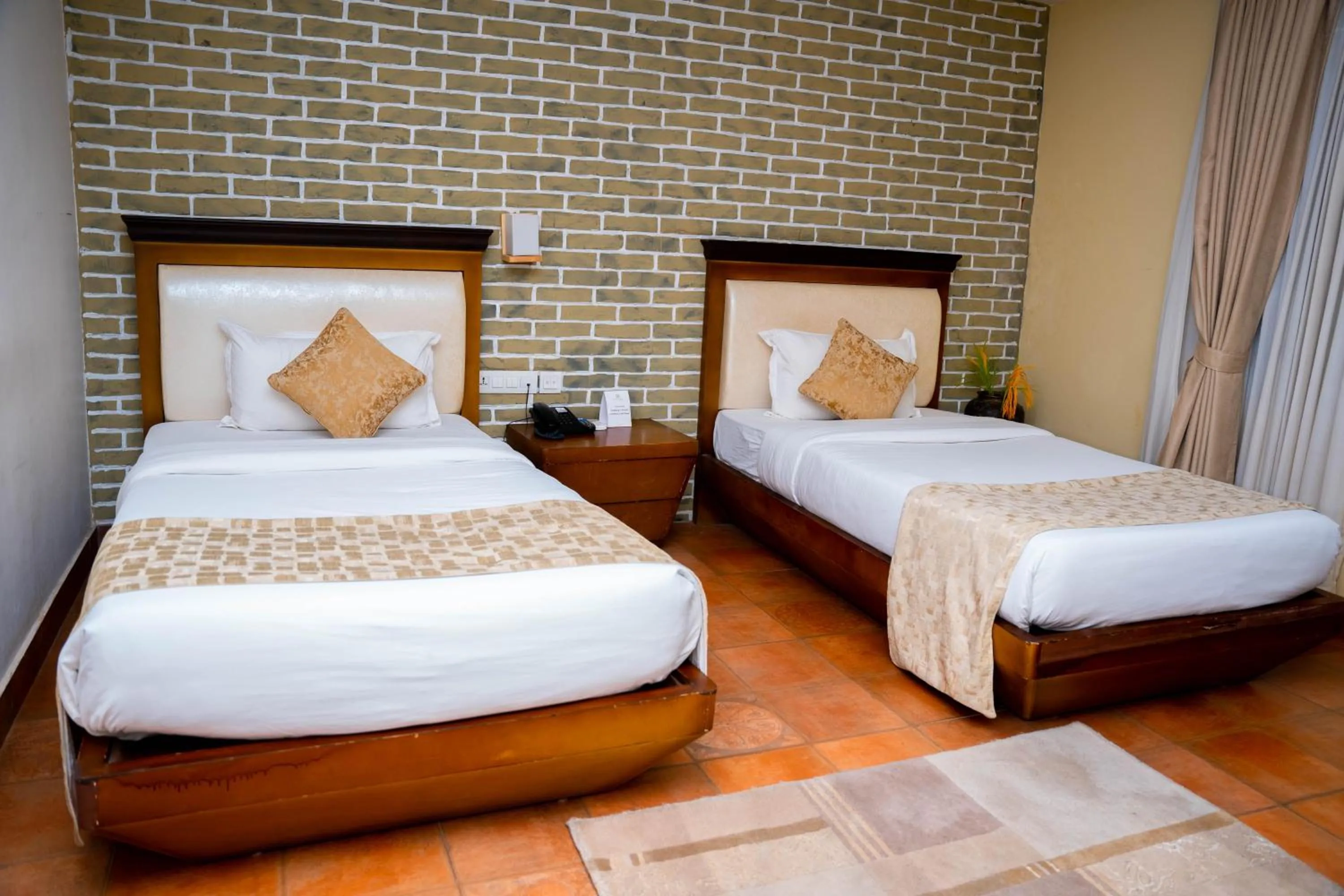 Bed in Teeka Resort Suites & Spa