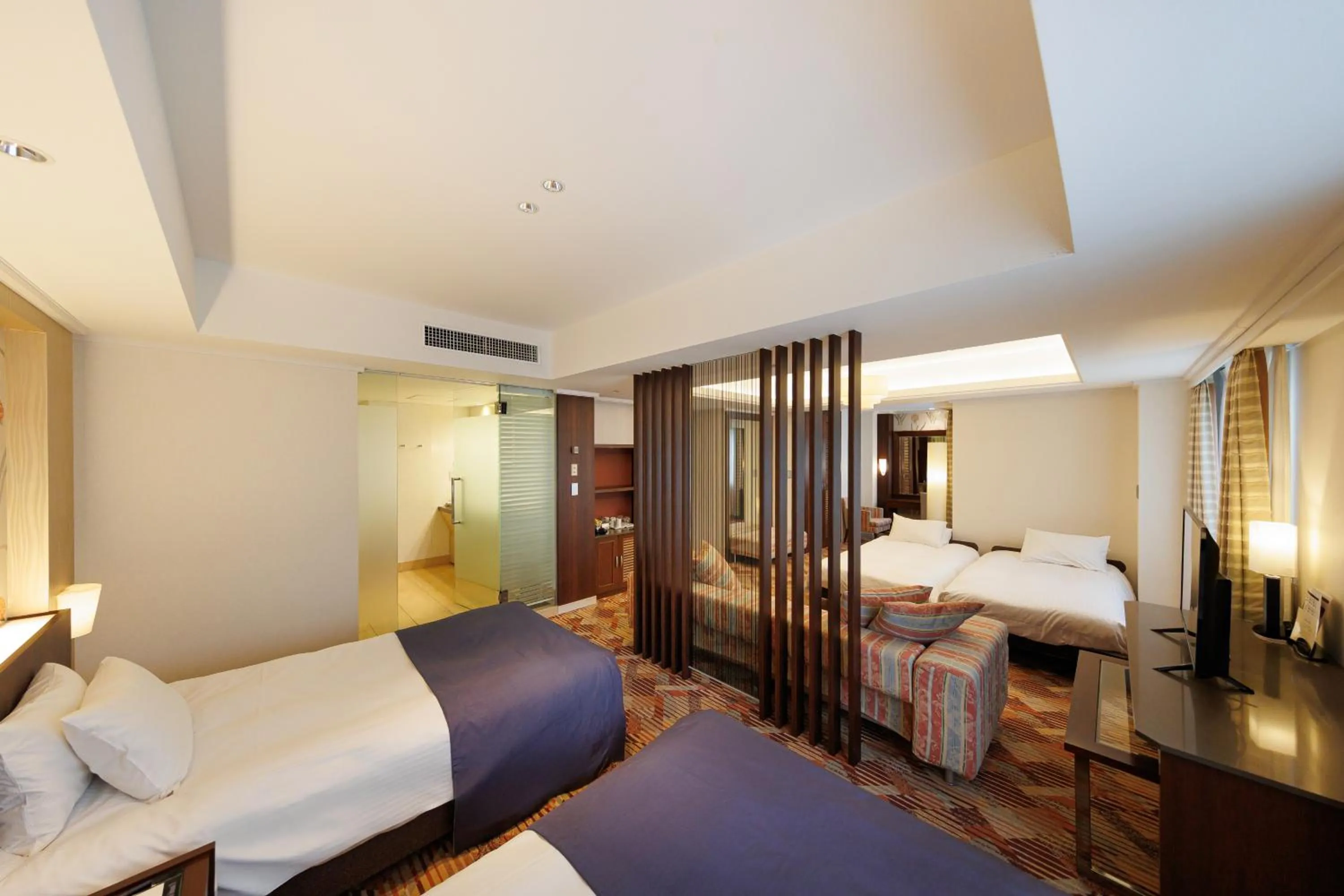 Bed in Kokusai 21 International Hotel