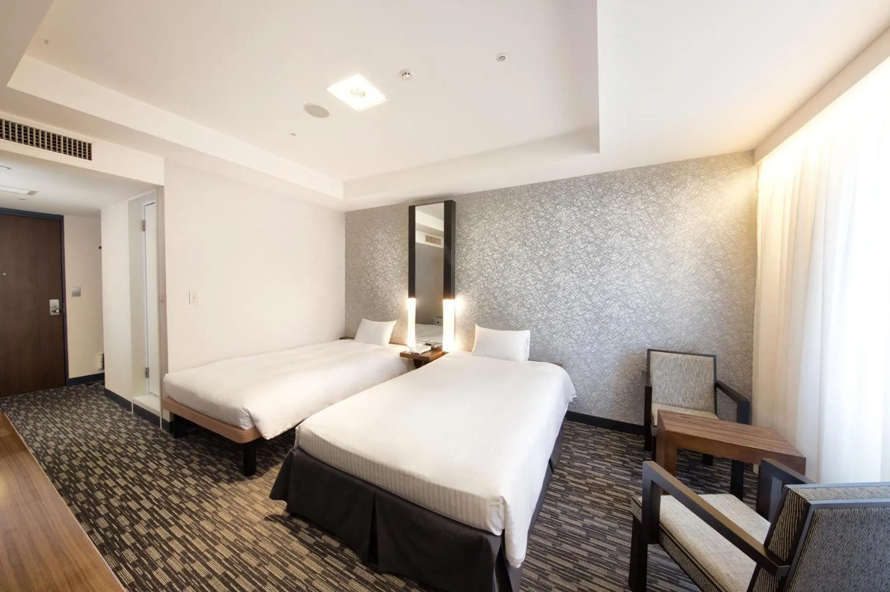 Bed in Kokusai 21 International Hotel