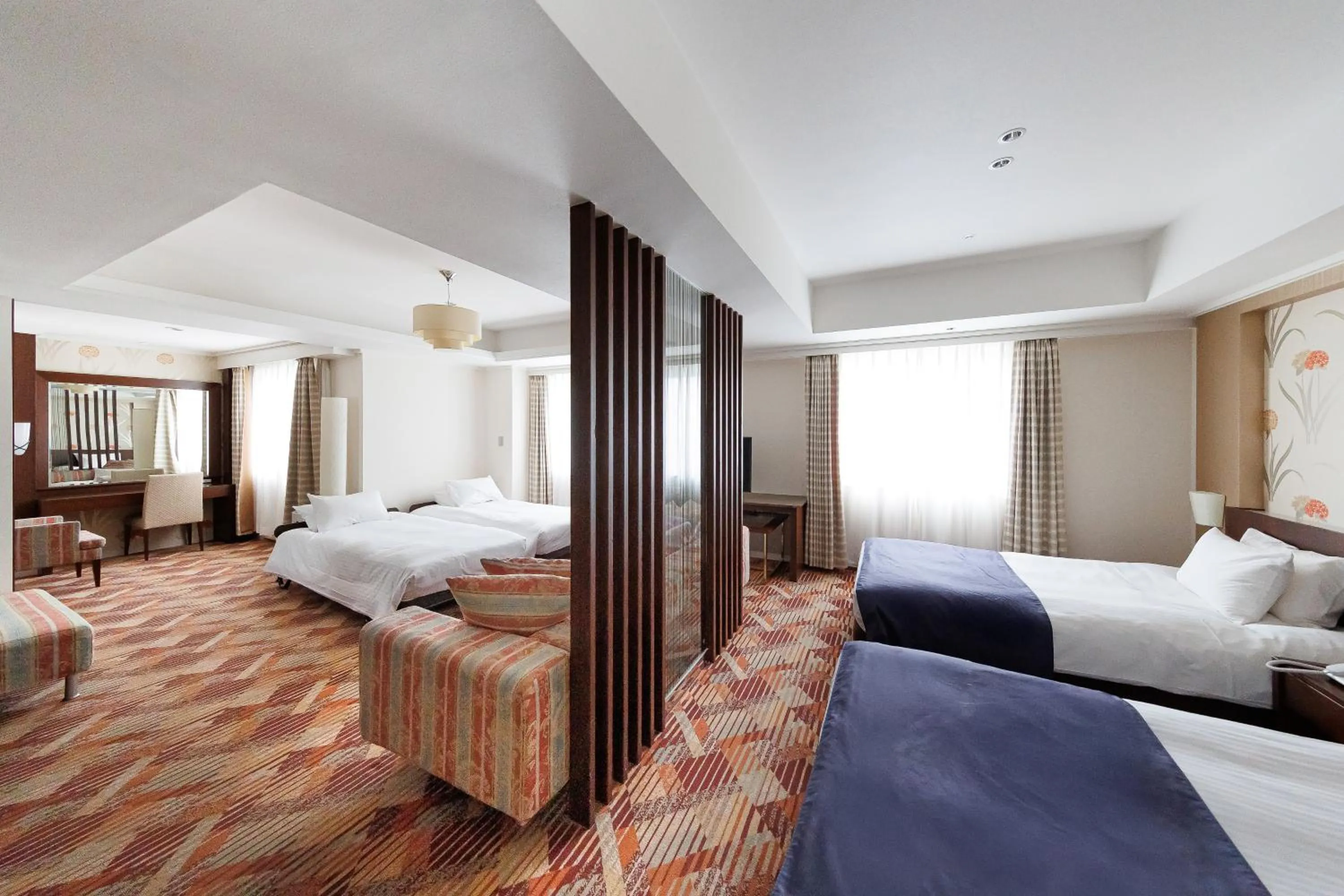 Bed in Kokusai 21 International Hotel