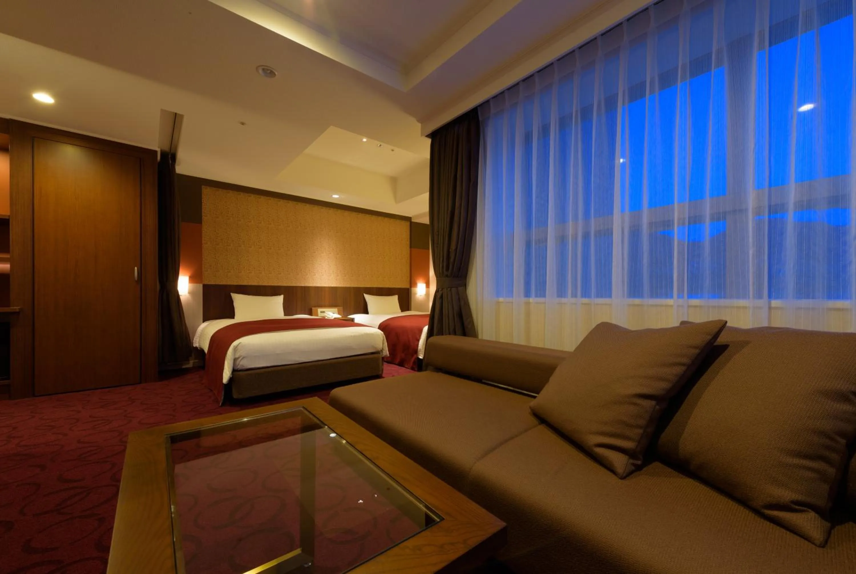 Bed in Kokusai 21 International Hotel