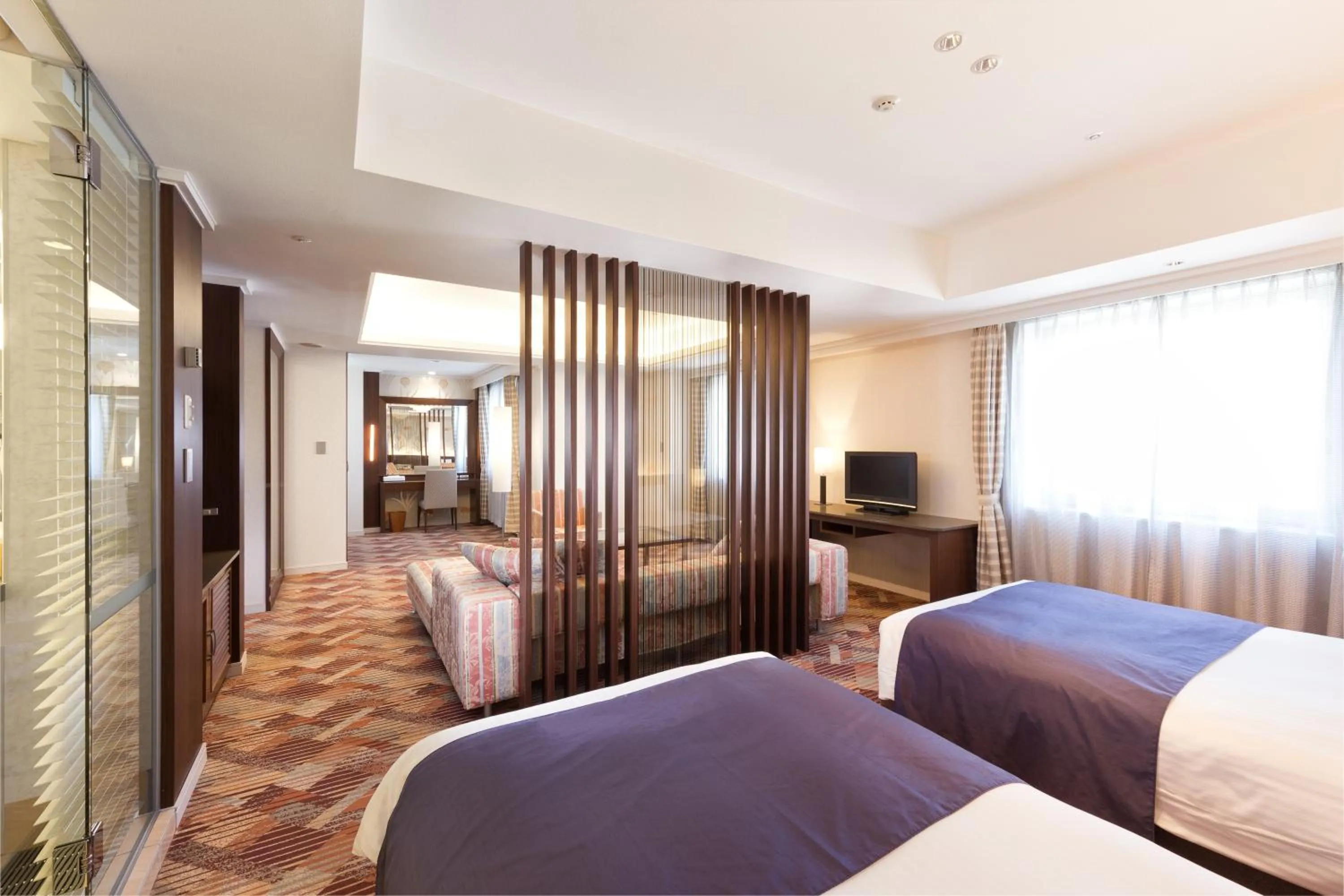 Bed in Kokusai 21 International Hotel