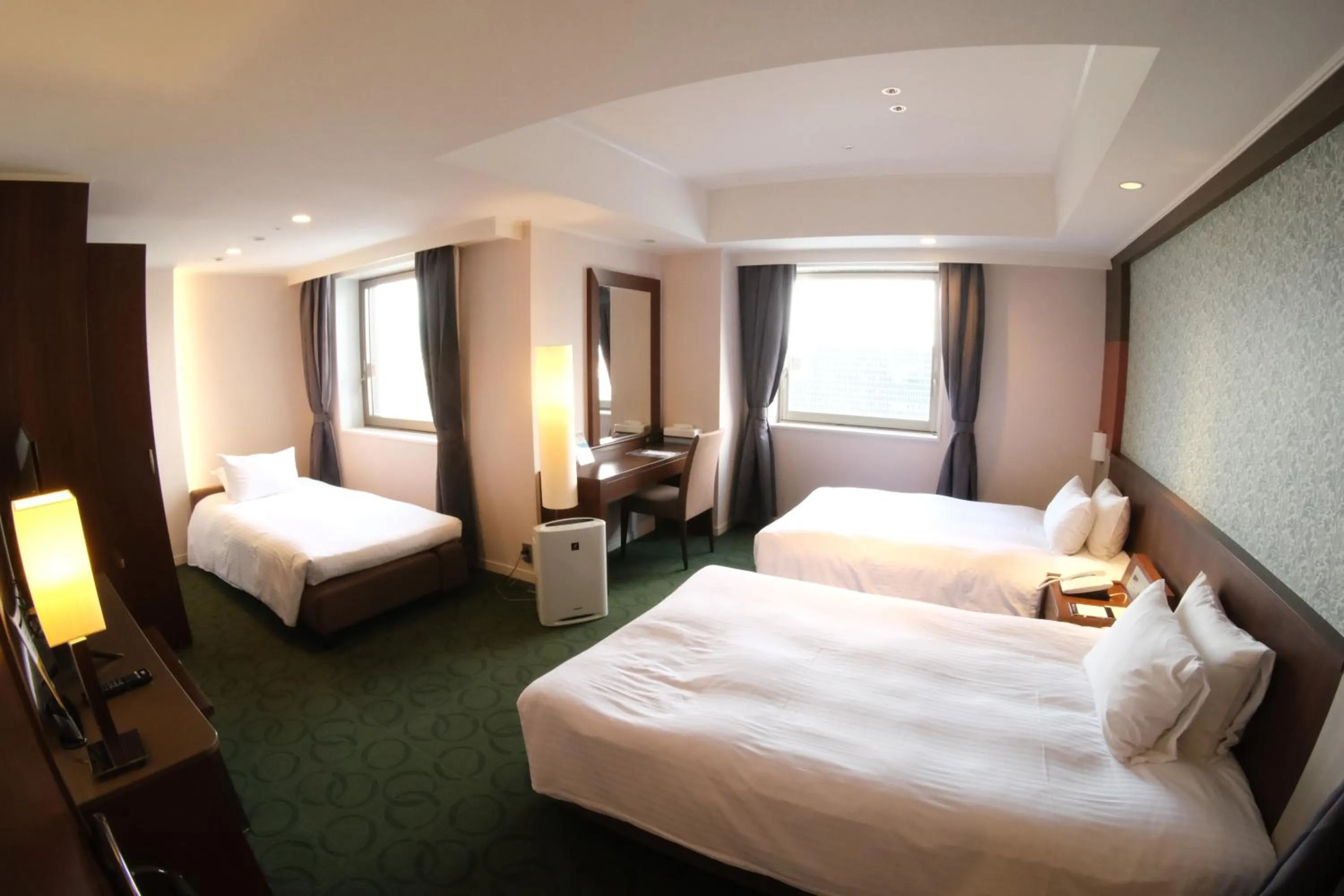 Bed in Kokusai 21 International Hotel