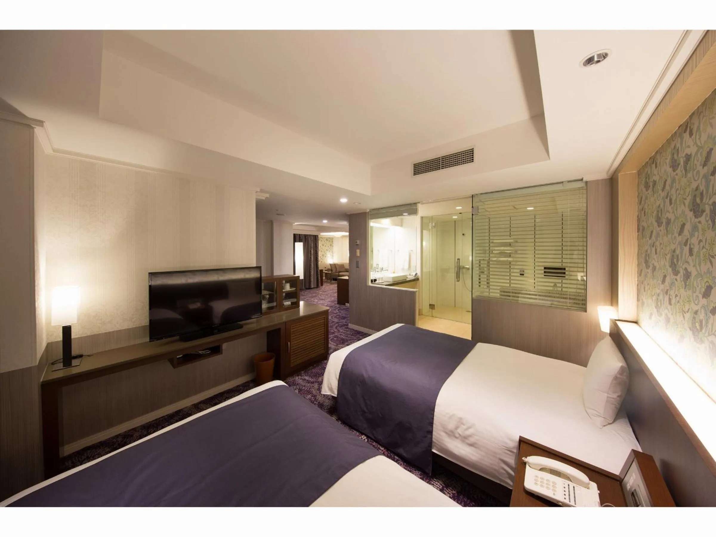 Bed in Kokusai 21 International Hotel