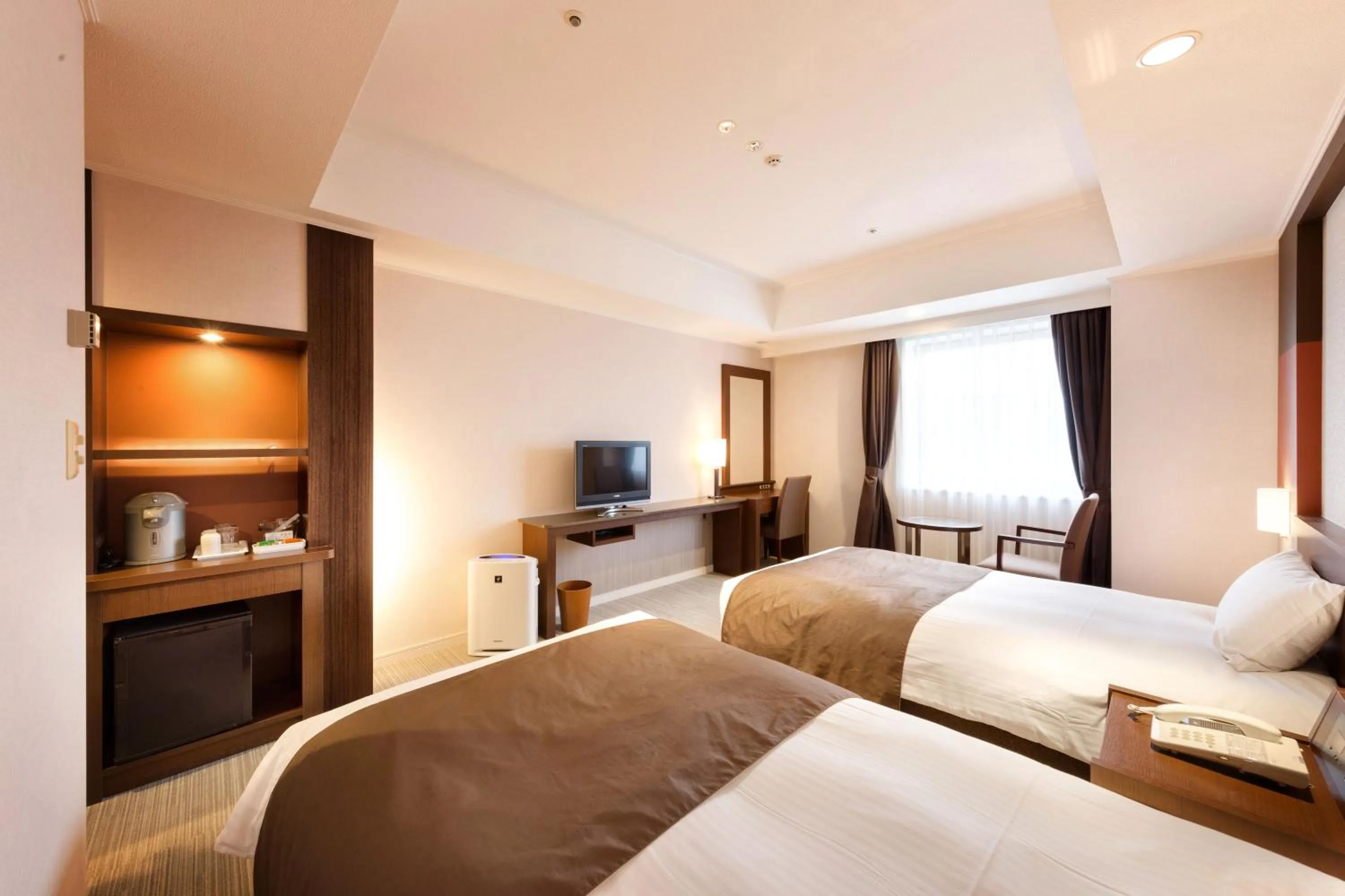 Bed in Kokusai 21 International Hotel