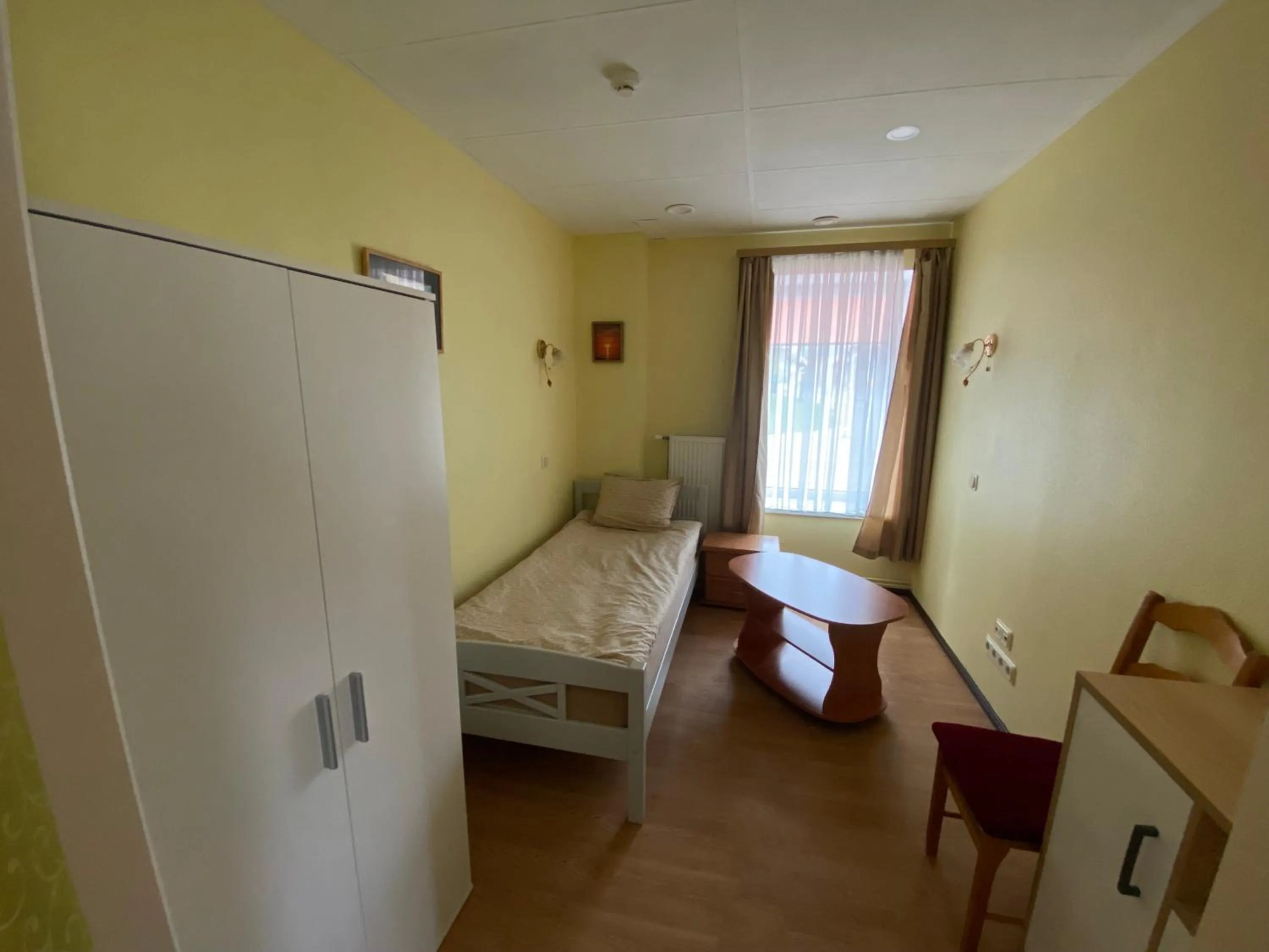 Bed in Apartment Hotel Rubini