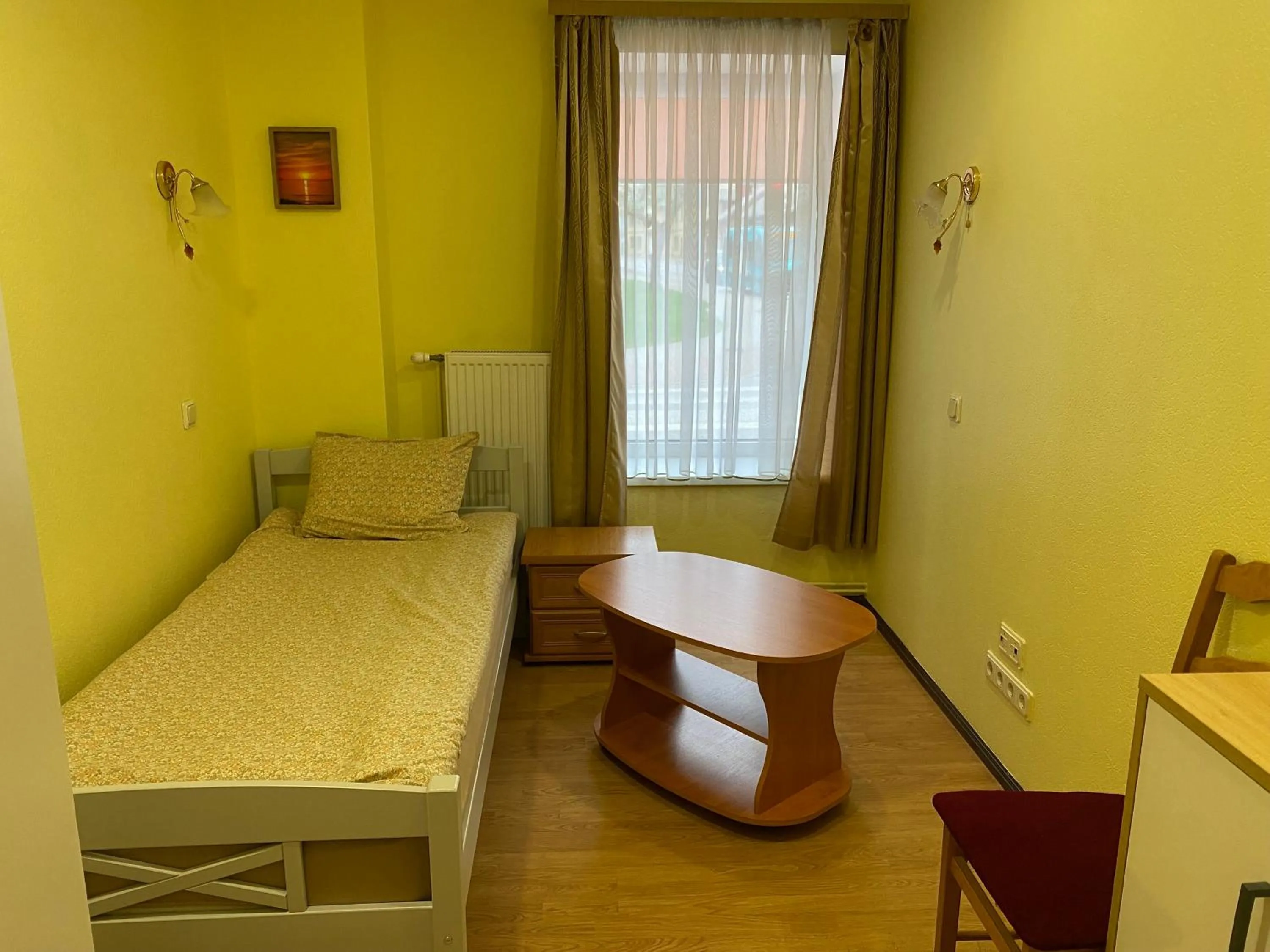 Bed in Apartment Hotel Rubini