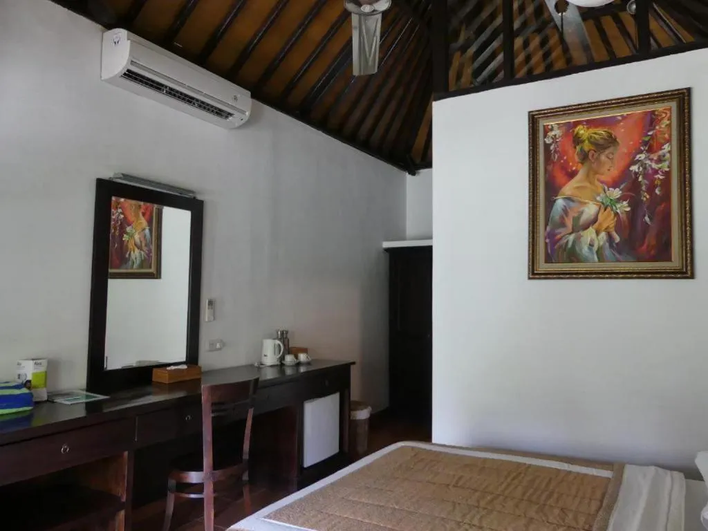 Bed in Liberty Dive Resort