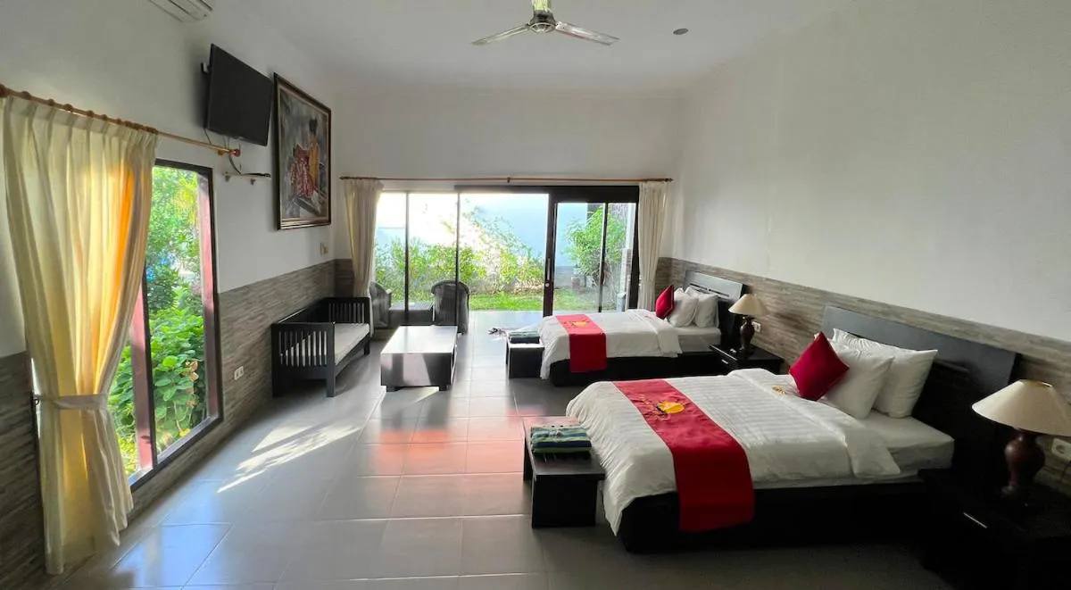 Bed in Liberty Dive Resort