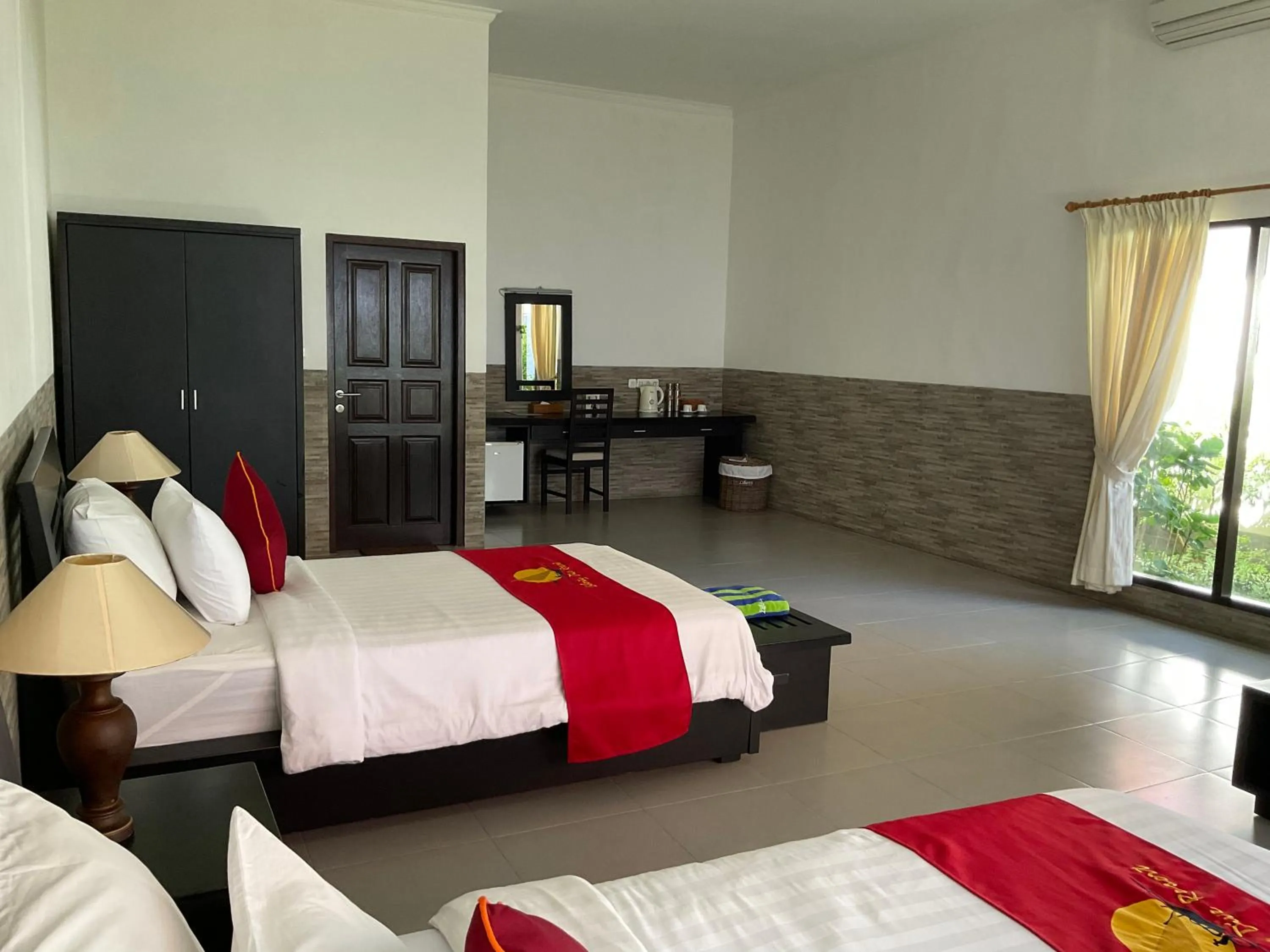 Bed in Liberty Dive Resort