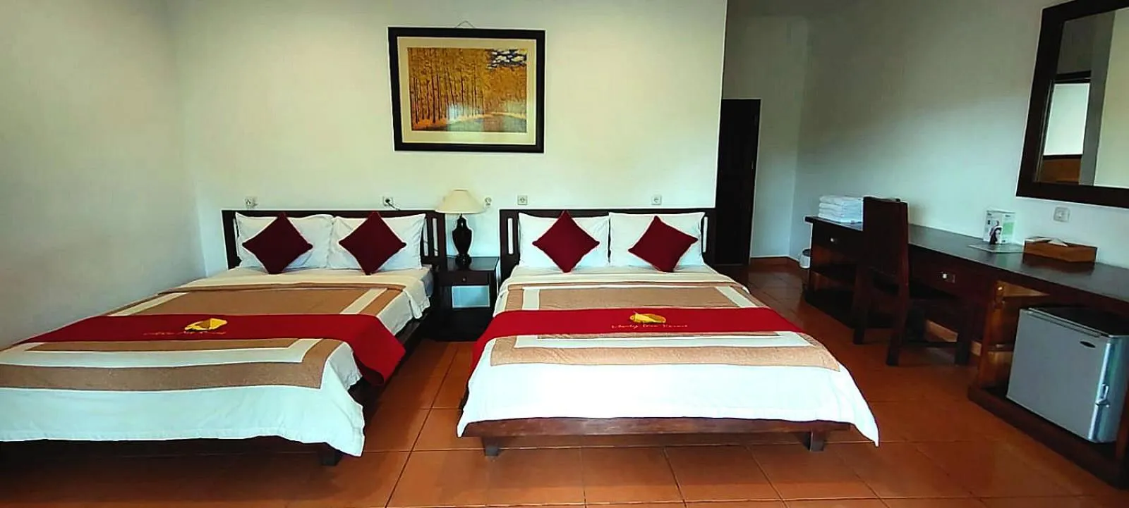 Bed in Liberty Dive Resort