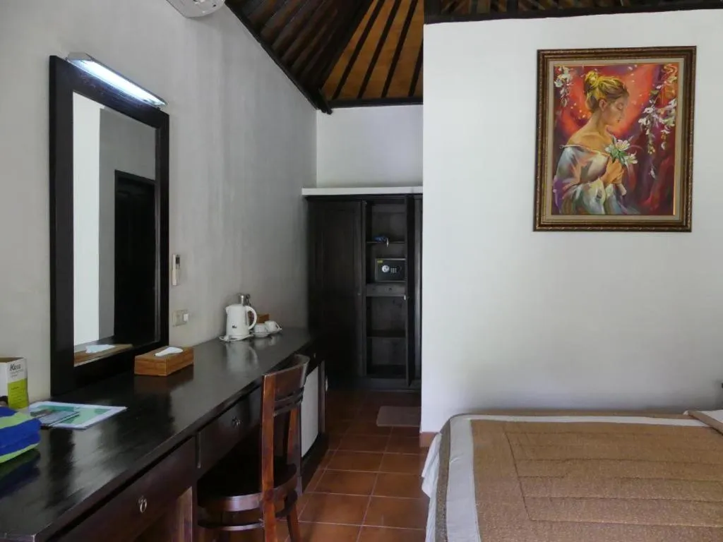 Bed in Liberty Dive Resort