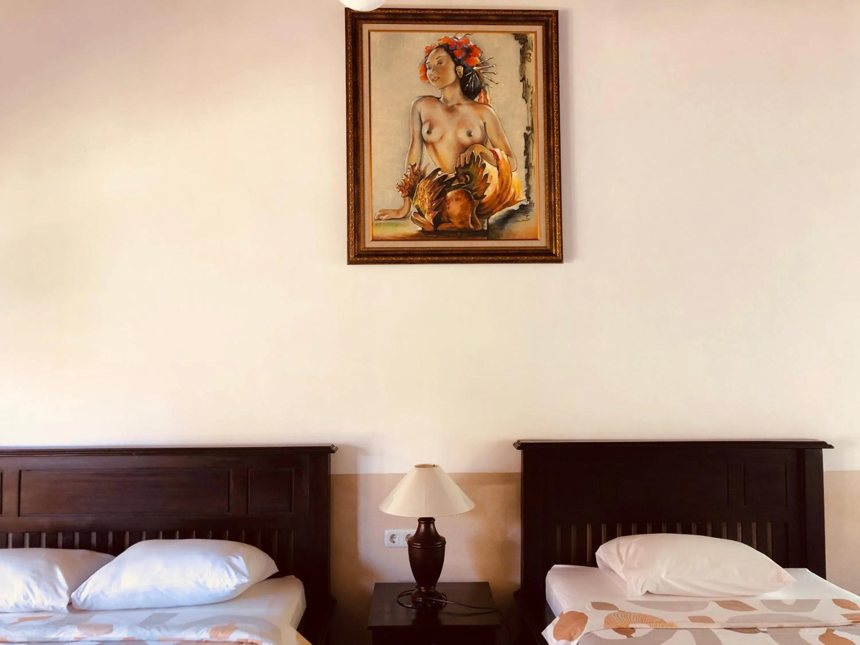 Bed in Liberty Dive Resort