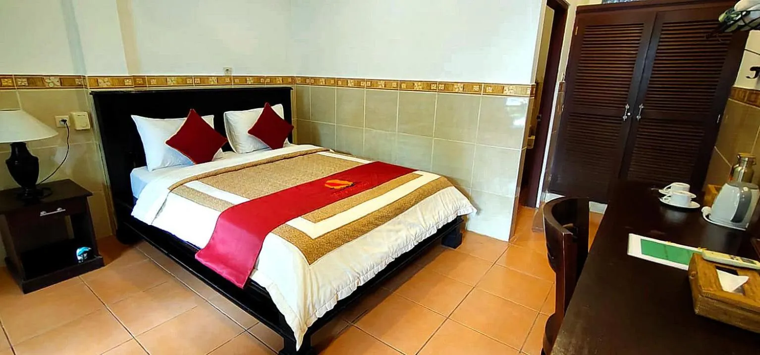 Bed in Liberty Dive Resort