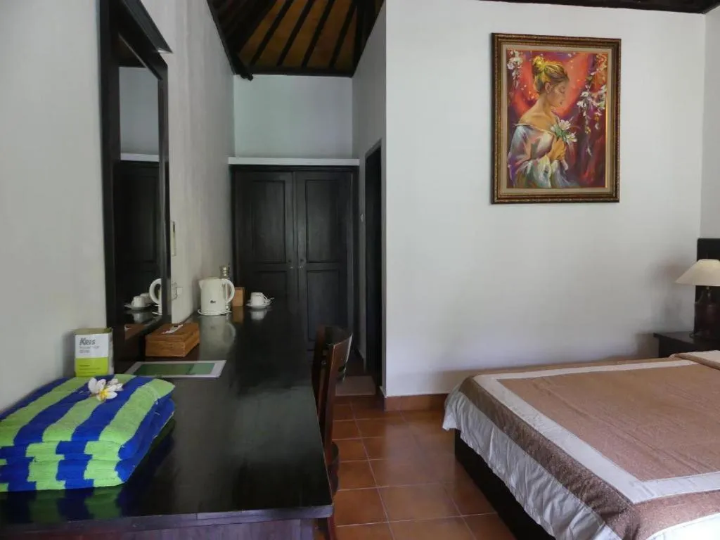 Bed in Liberty Dive Resort