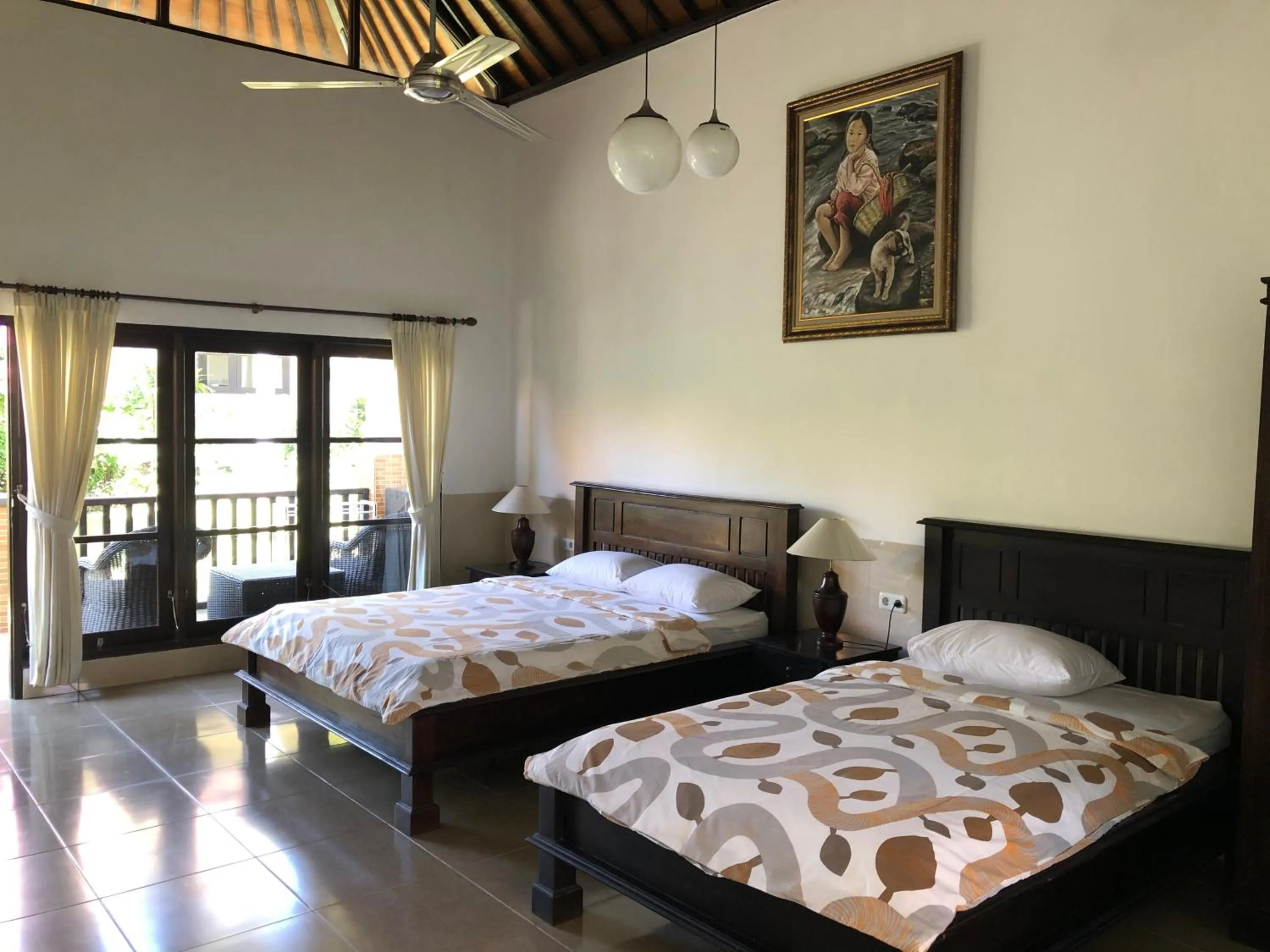 Bed in Liberty Dive Resort