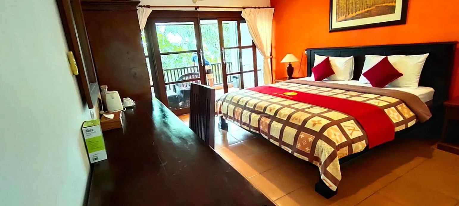 Bed in Liberty Dive Resort