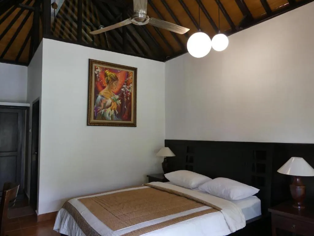 Bed in Liberty Dive Resort