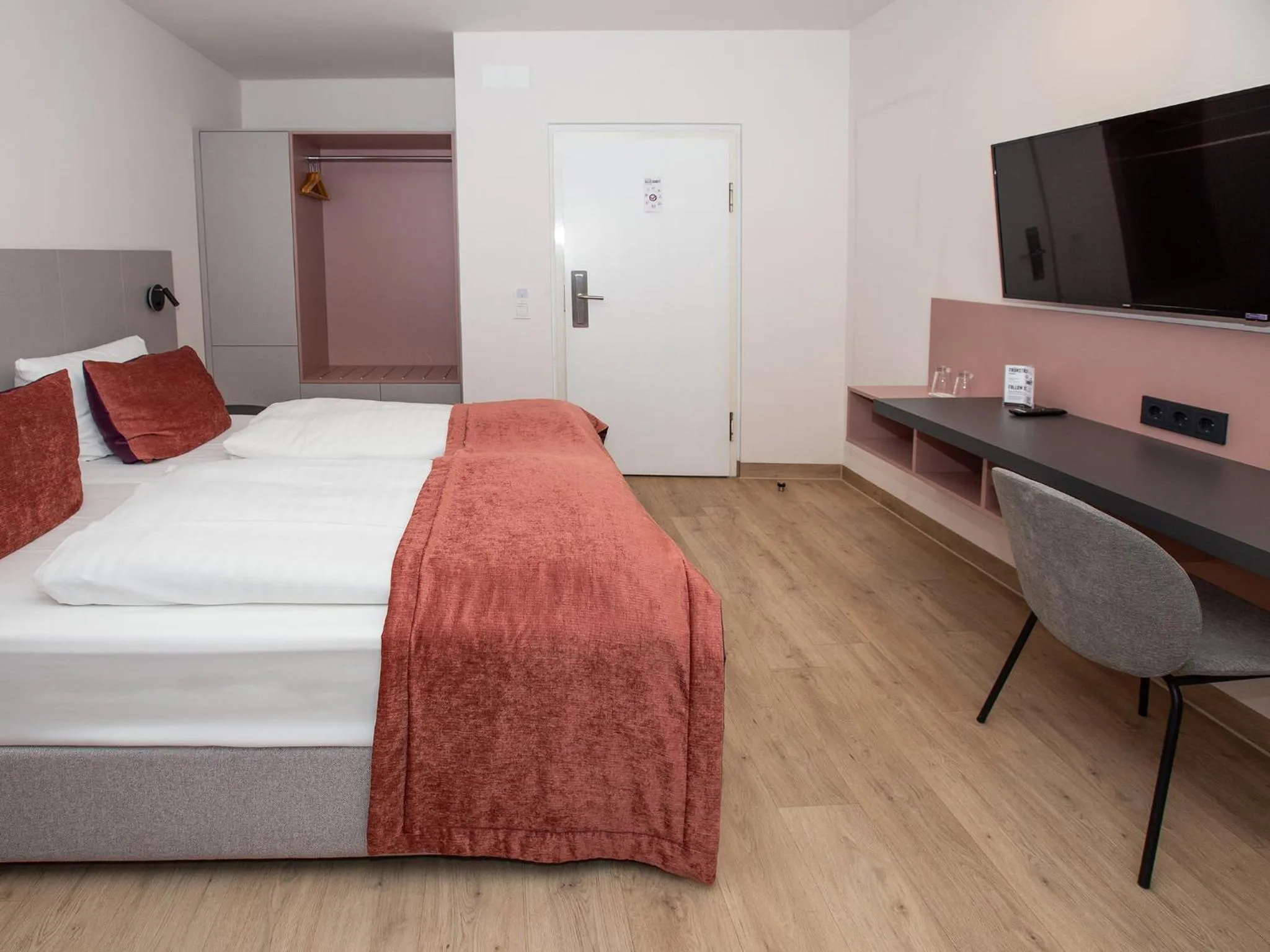 Photo of the whole room, Bed in DORMERO Hotel Bargenturm Lüneburg