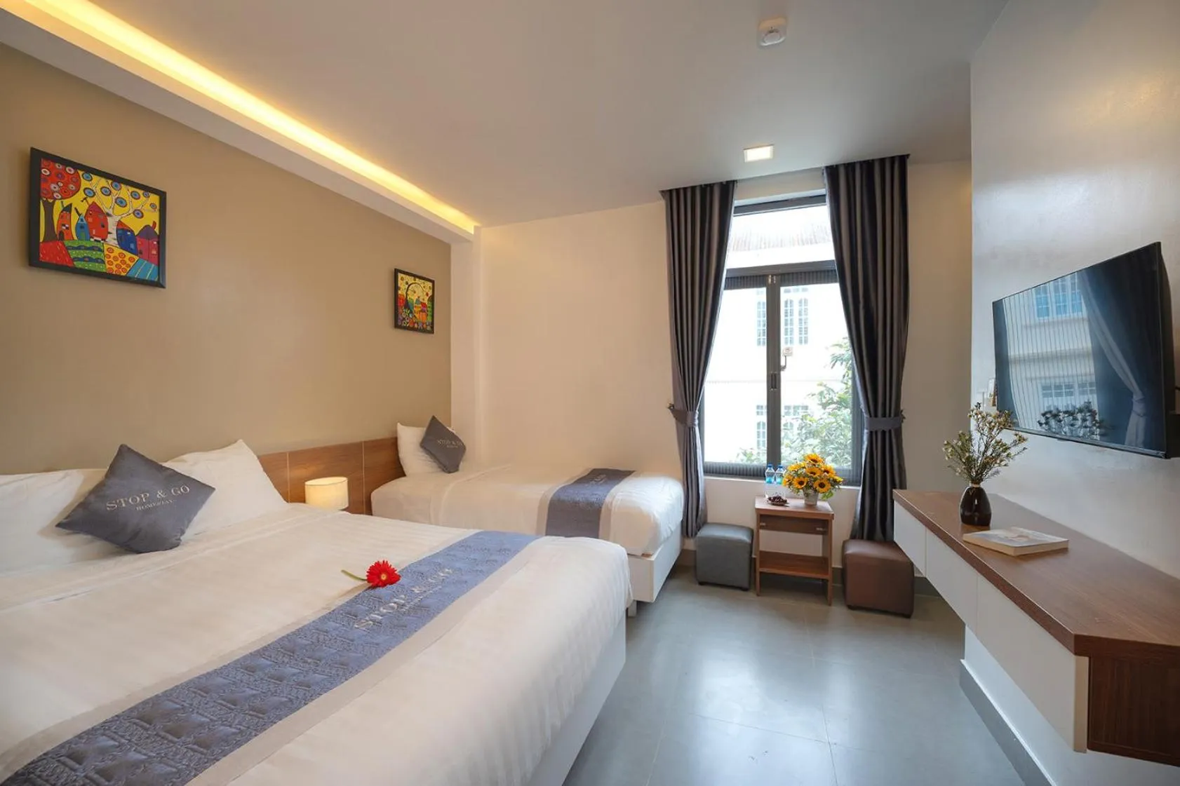 Bed in Stop and Go Boutique Homestay Hue